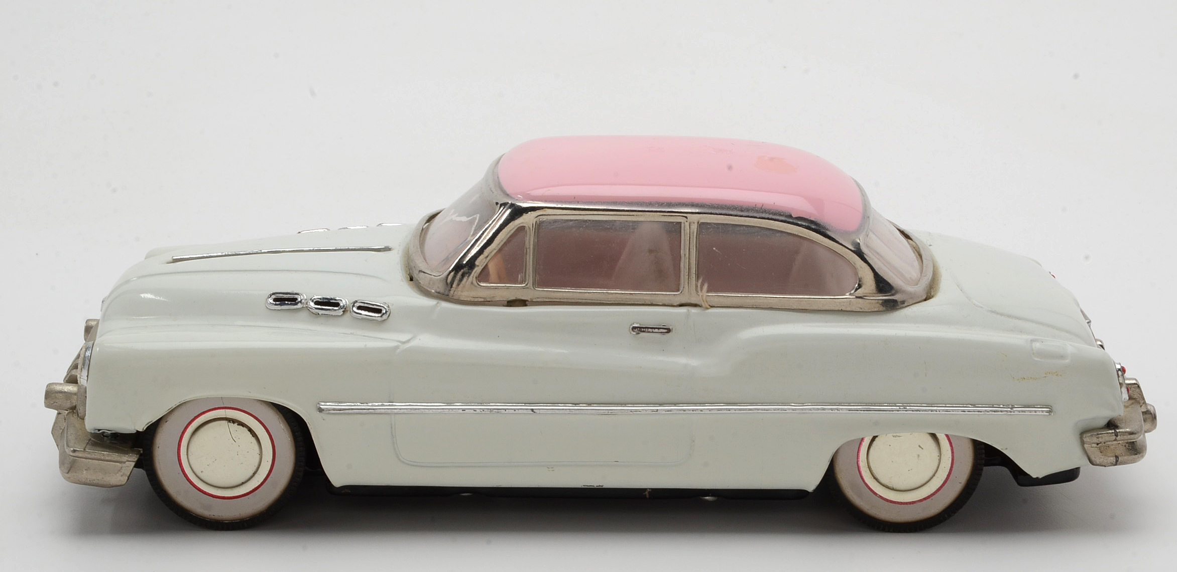 Pink and White Buick Super Die Cast Sedan