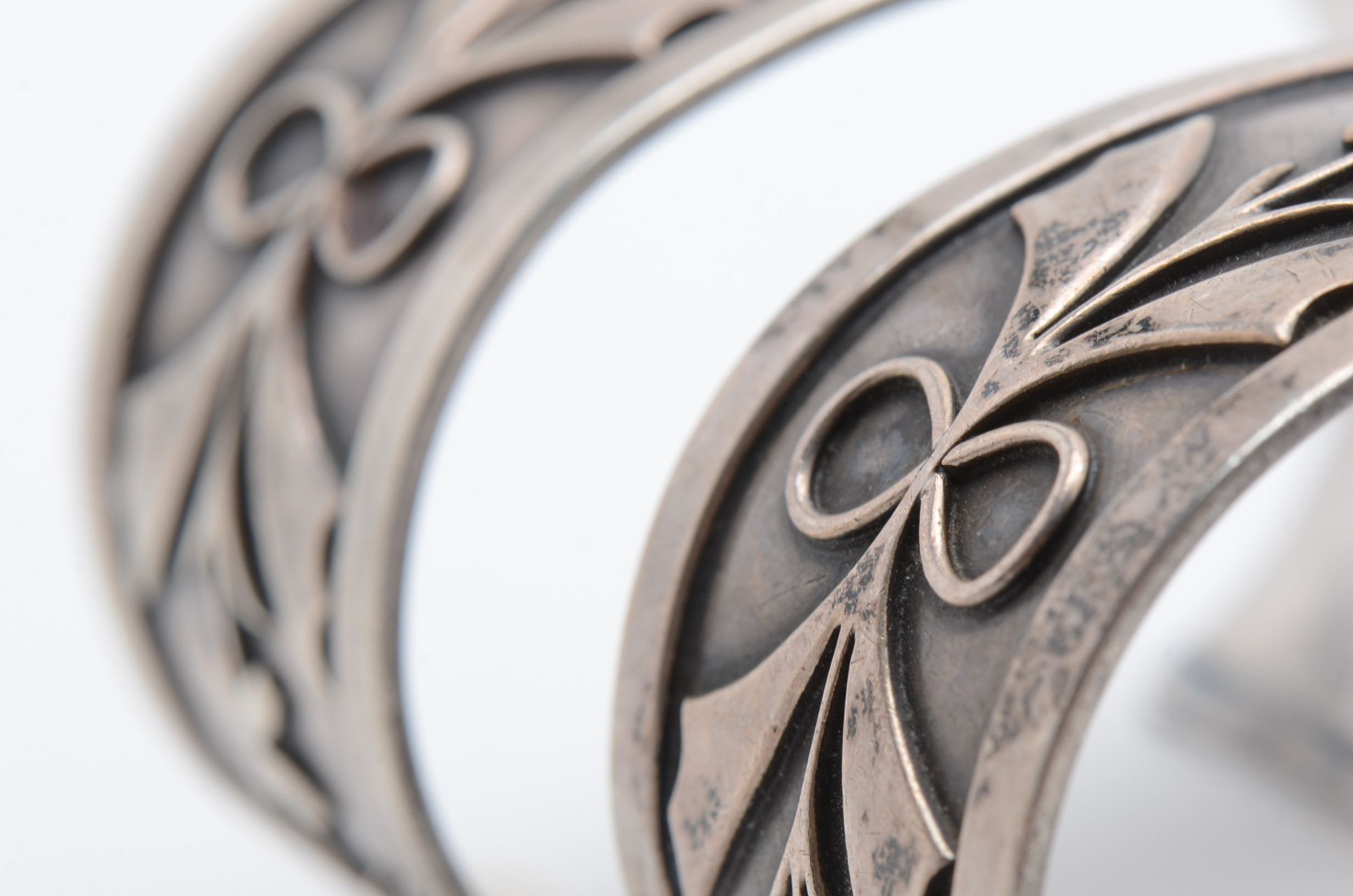 Pair of Sterling Silver Cuff Bracelets with Floral Design