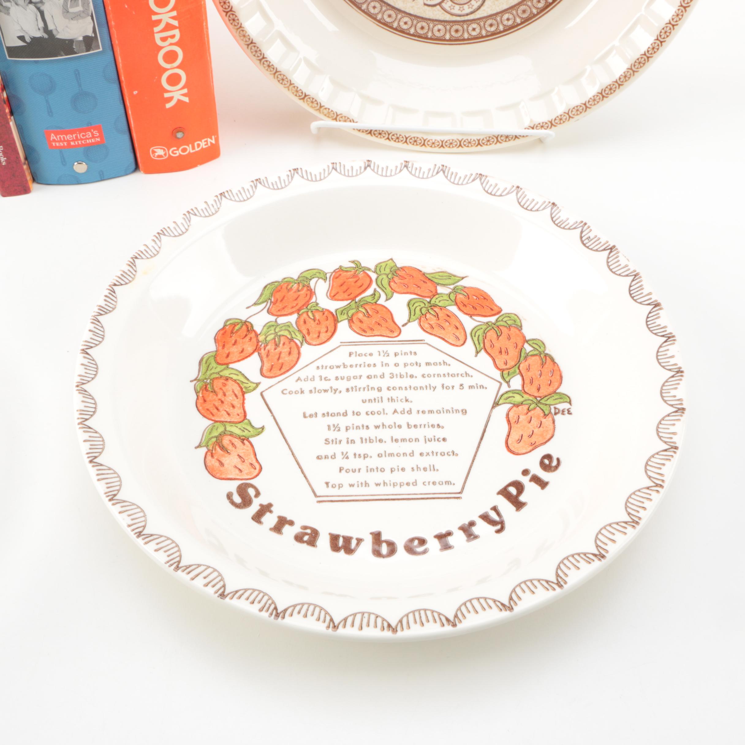 Assorted Cookbooks with Glass and Porcelain Dishes