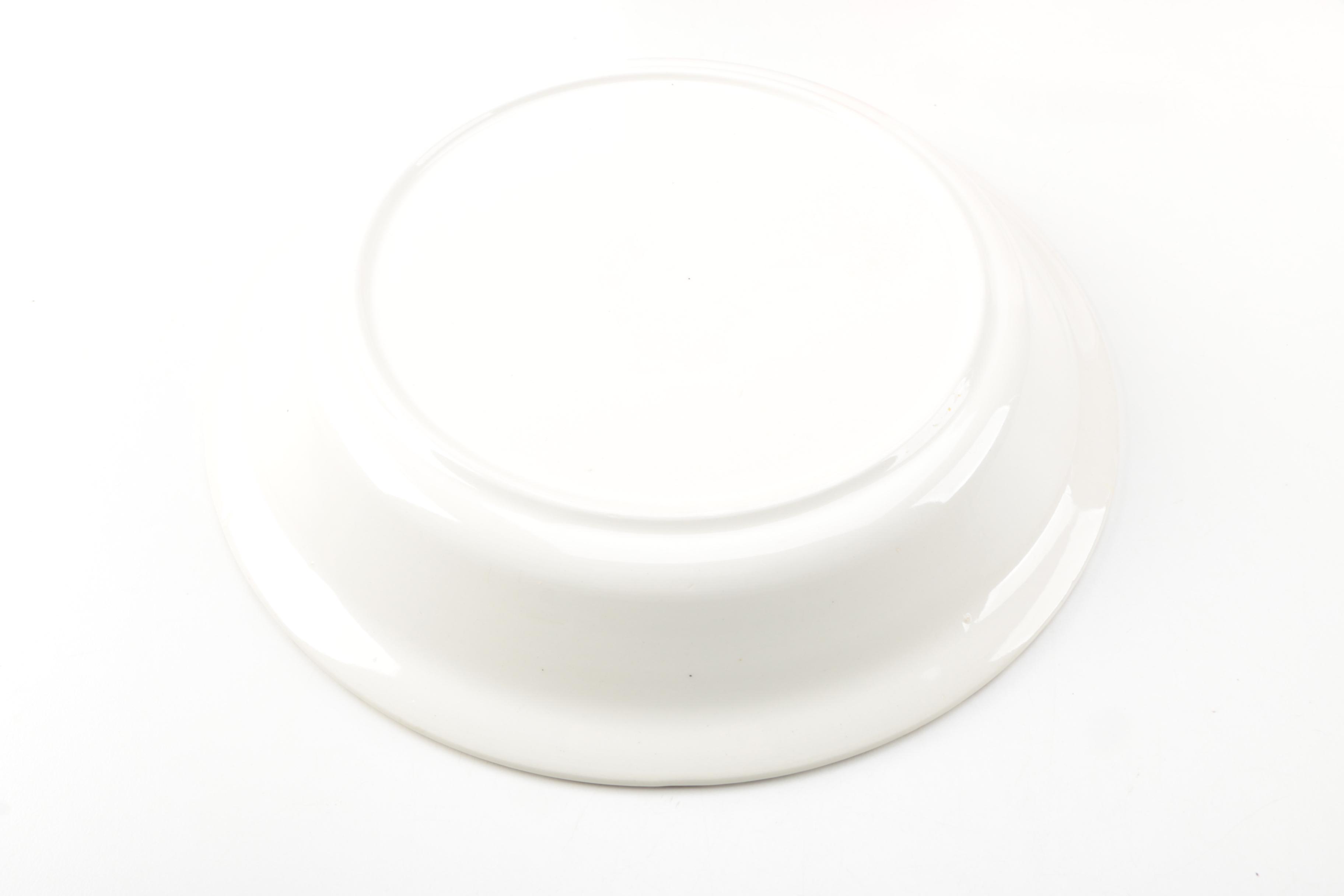 Assorted Cookbooks with Glass and Porcelain Dishes