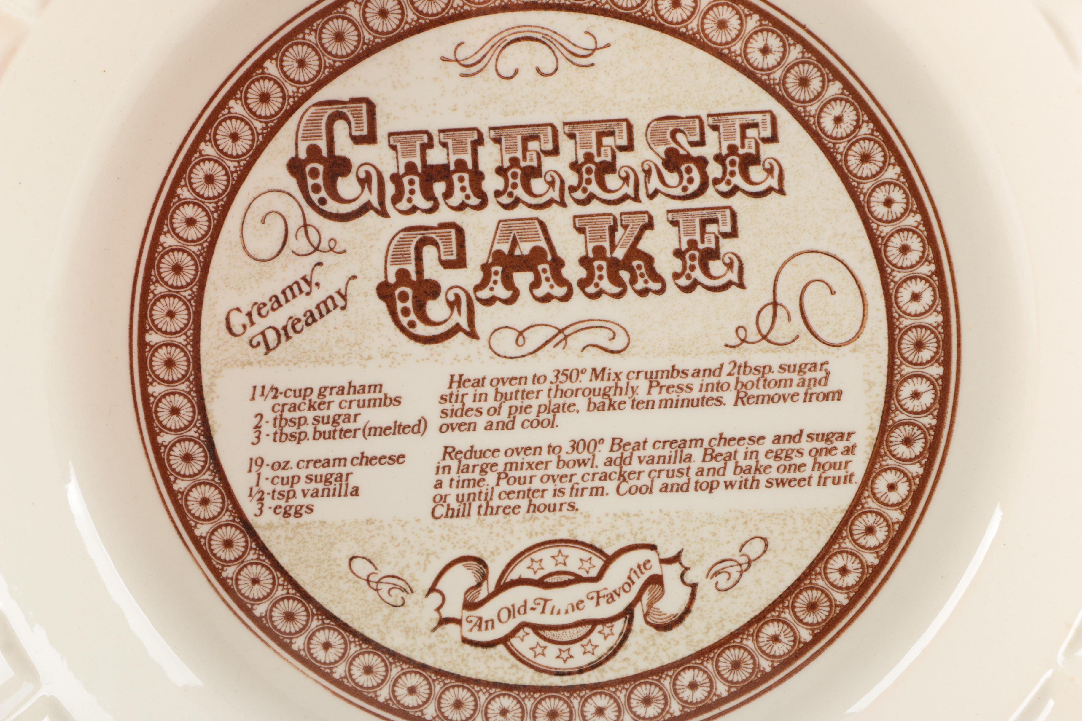 Assorted Cookbooks with Glass and Porcelain Dishes