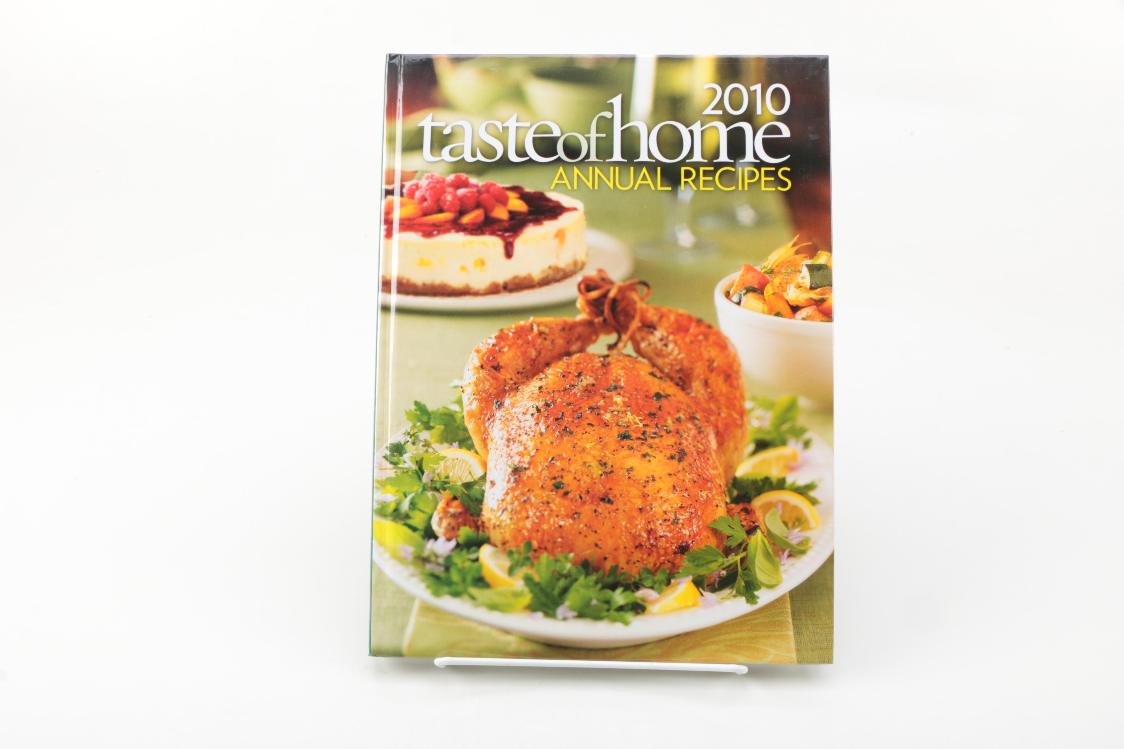 Assorted Cookbooks with Glass and Porcelain Dishes