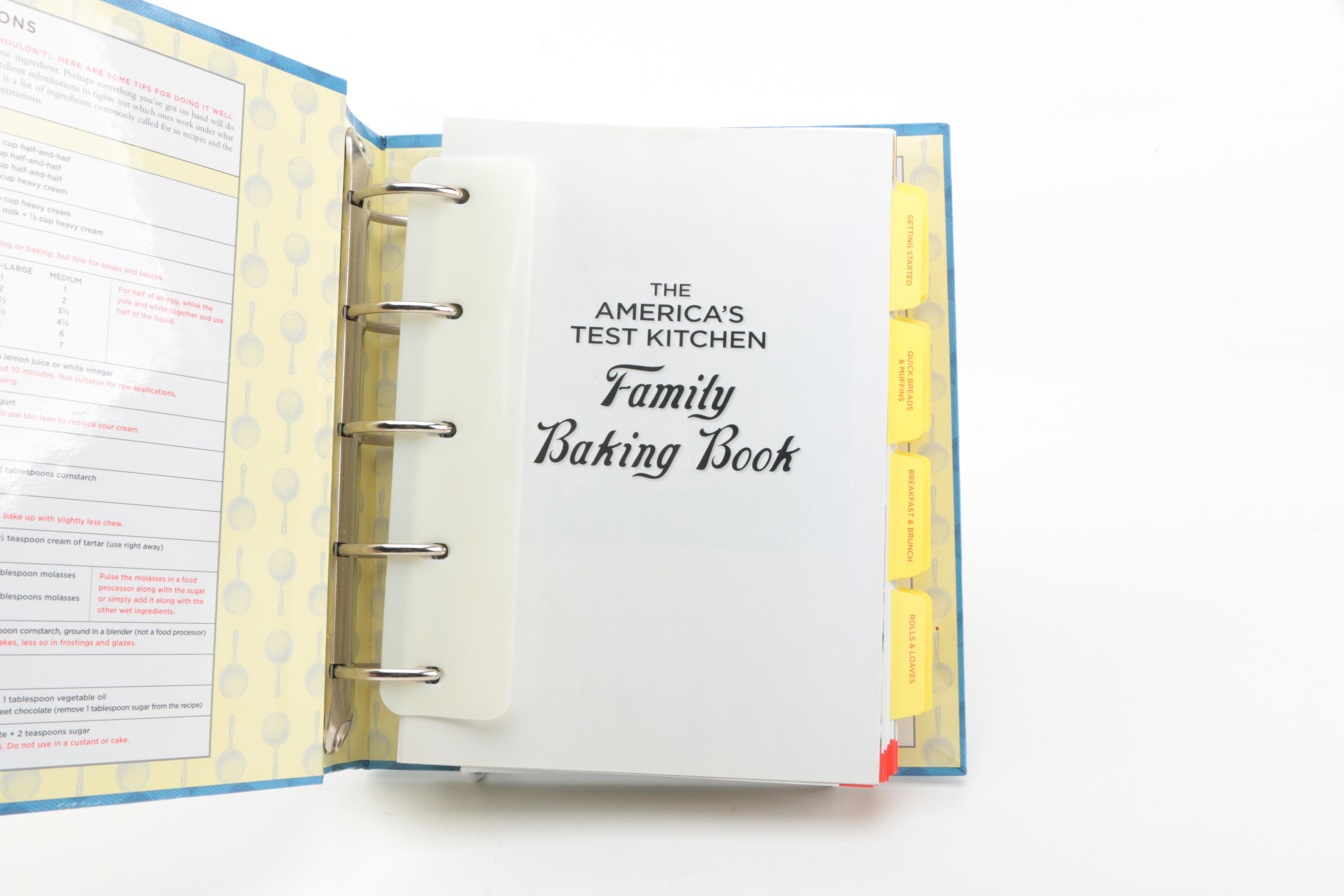 Assorted Cookbooks with Glass and Porcelain Dishes