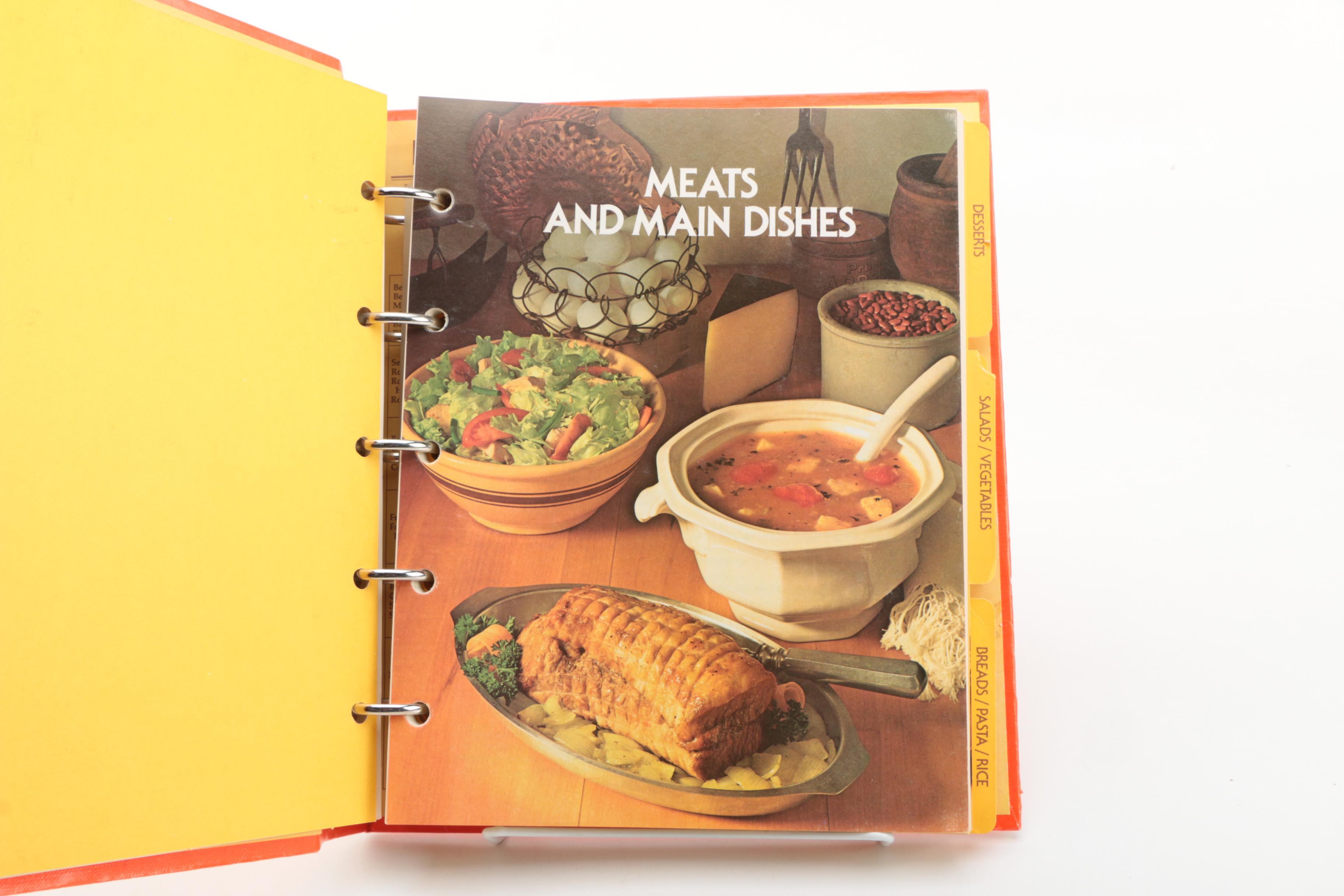 Assorted Cookbooks with Glass and Porcelain Dishes