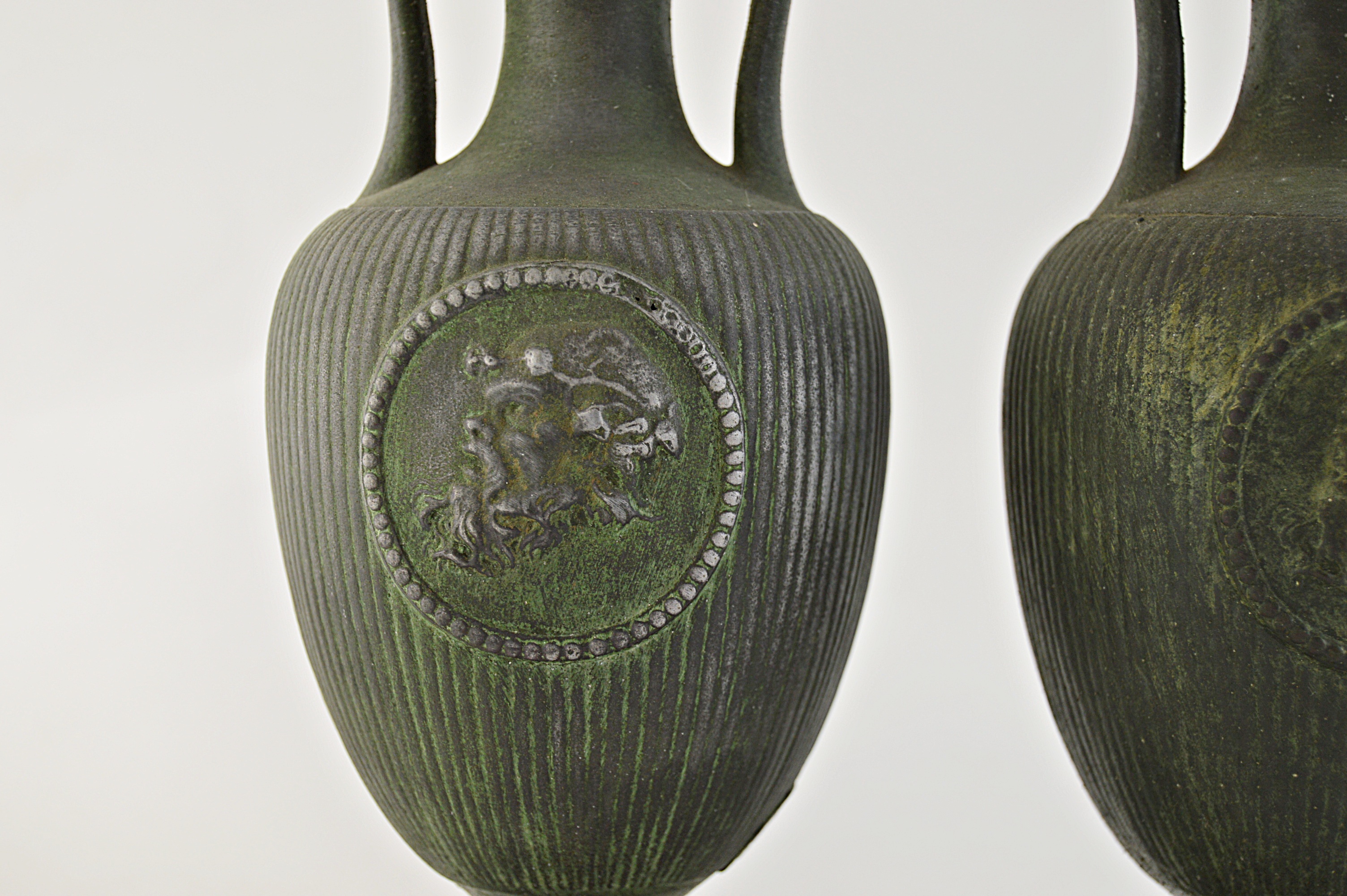 Pair of Classical Metal Urns in a Verdigris Finish