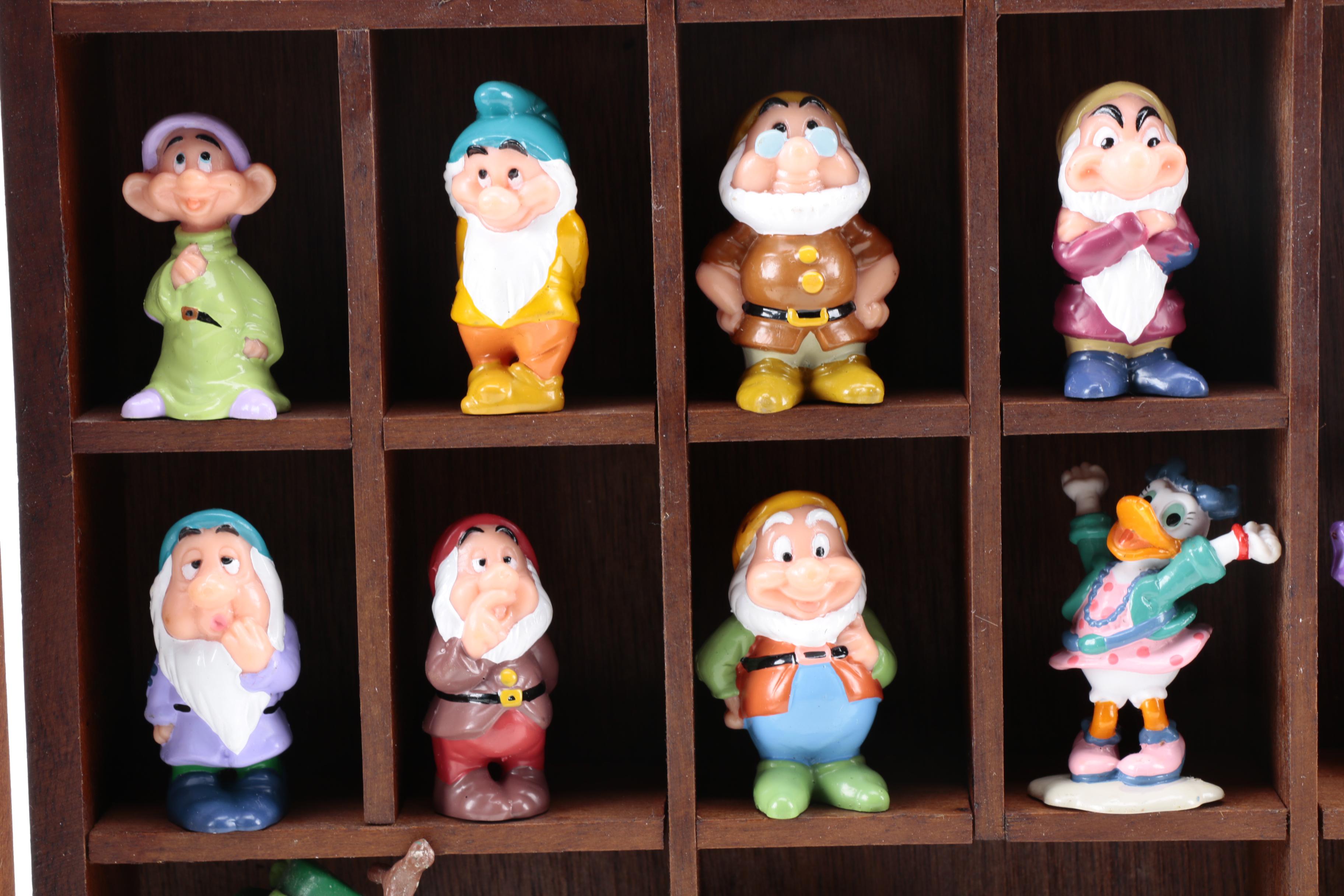 Disney Figures in Display Cabinet