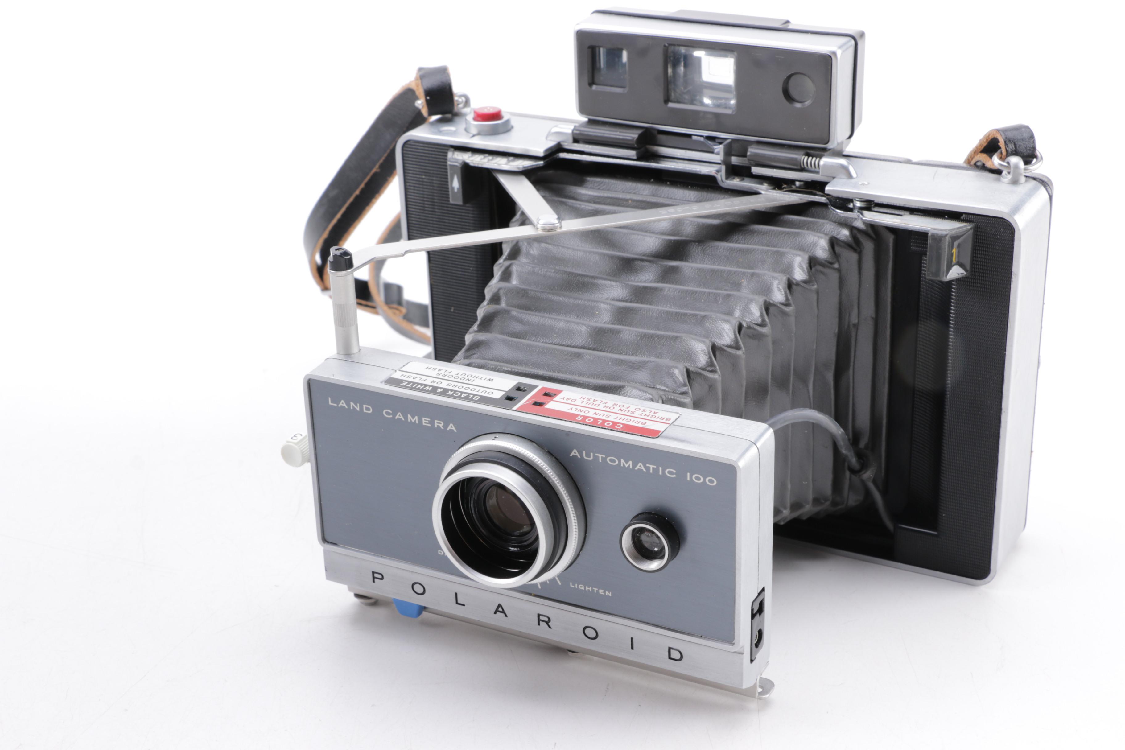 Polaroid Camera and Kodak Movie Light