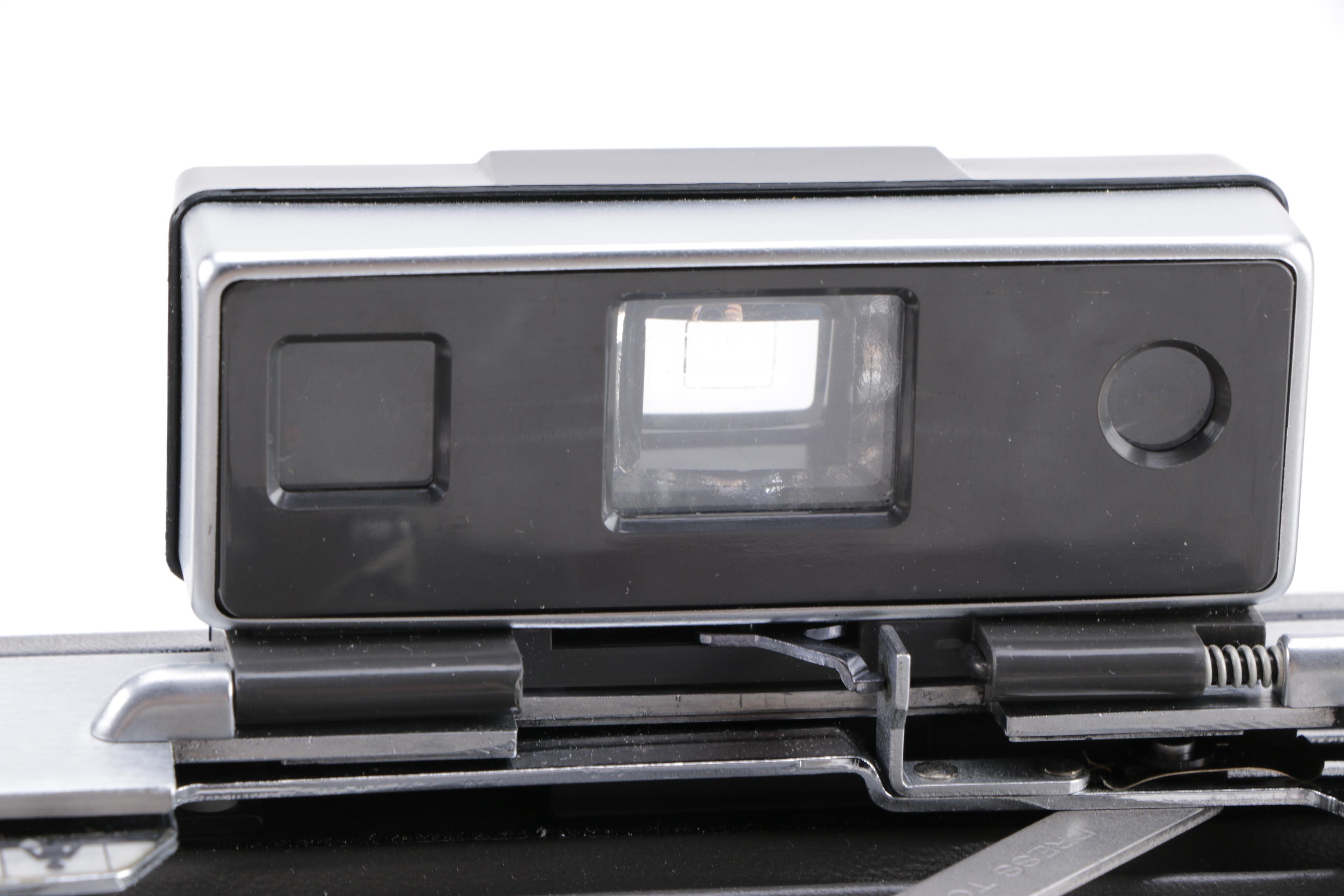 Polaroid Camera and Kodak Movie Light