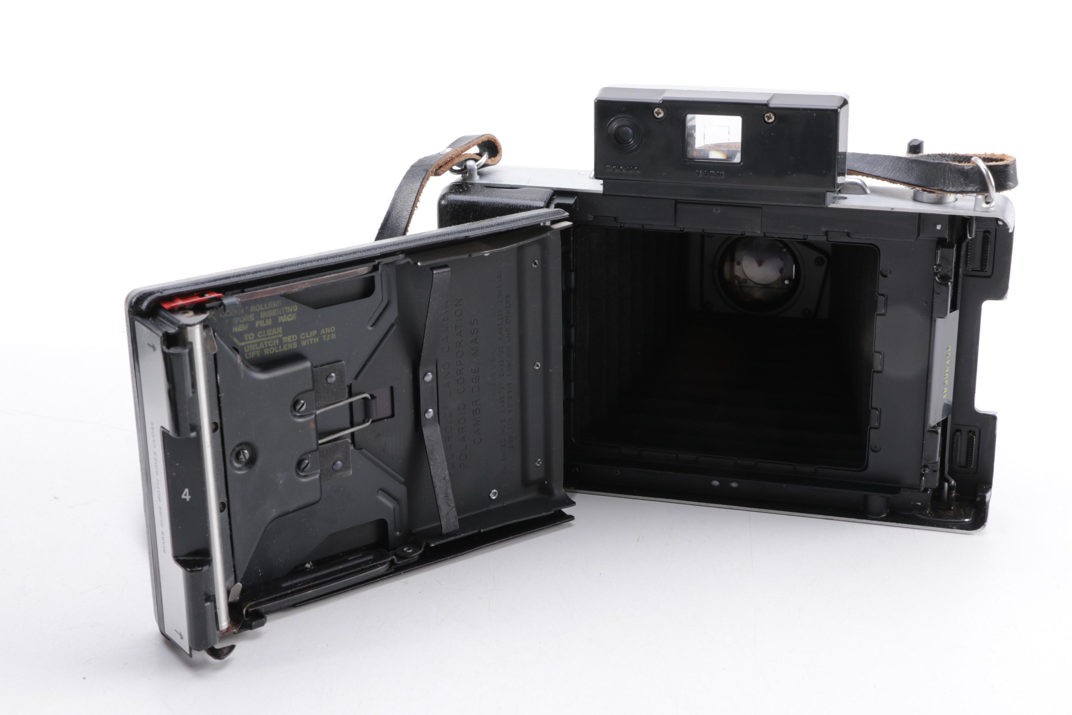 Polaroid Camera and Kodak Movie Light