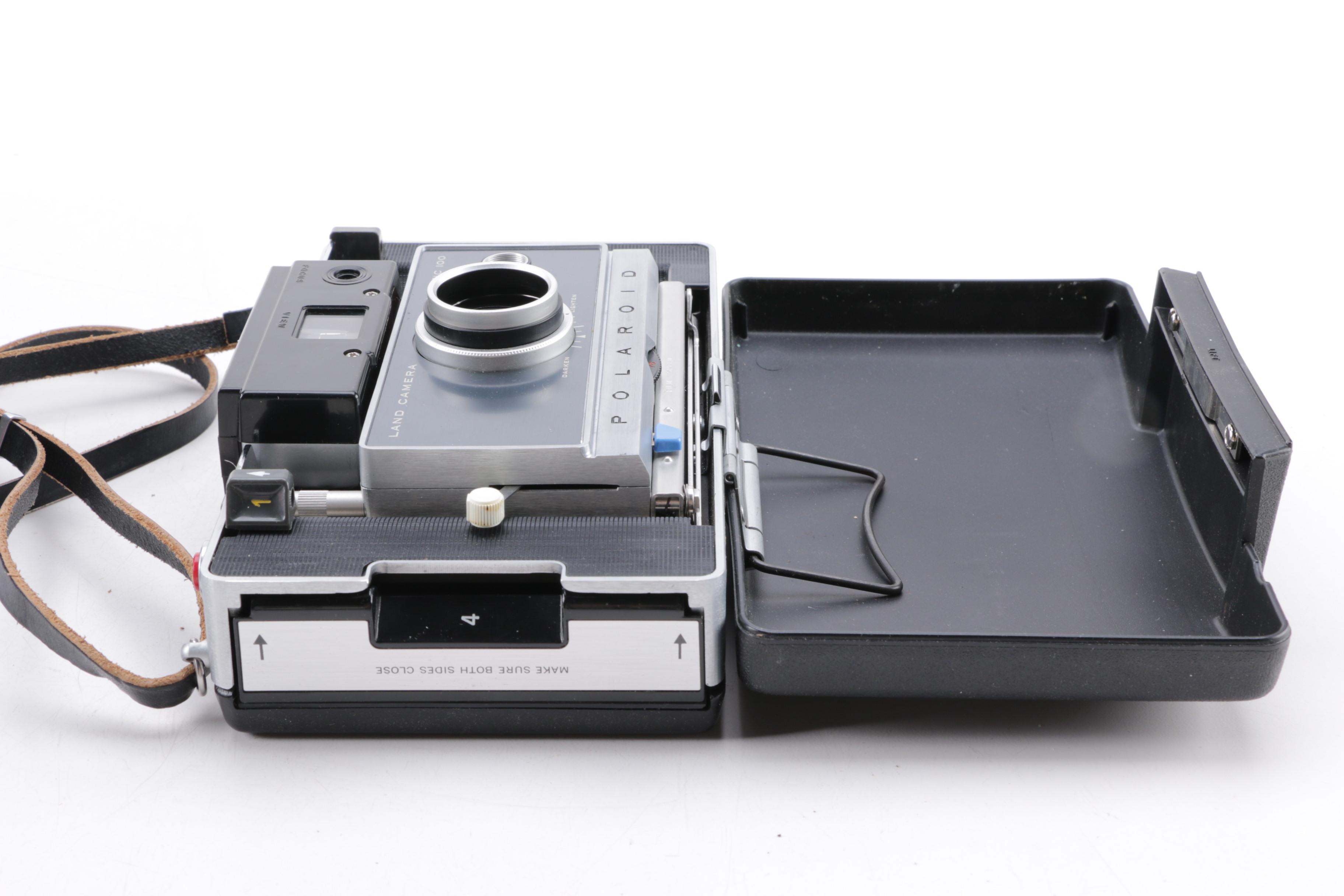 Polaroid Camera and Kodak Movie Light