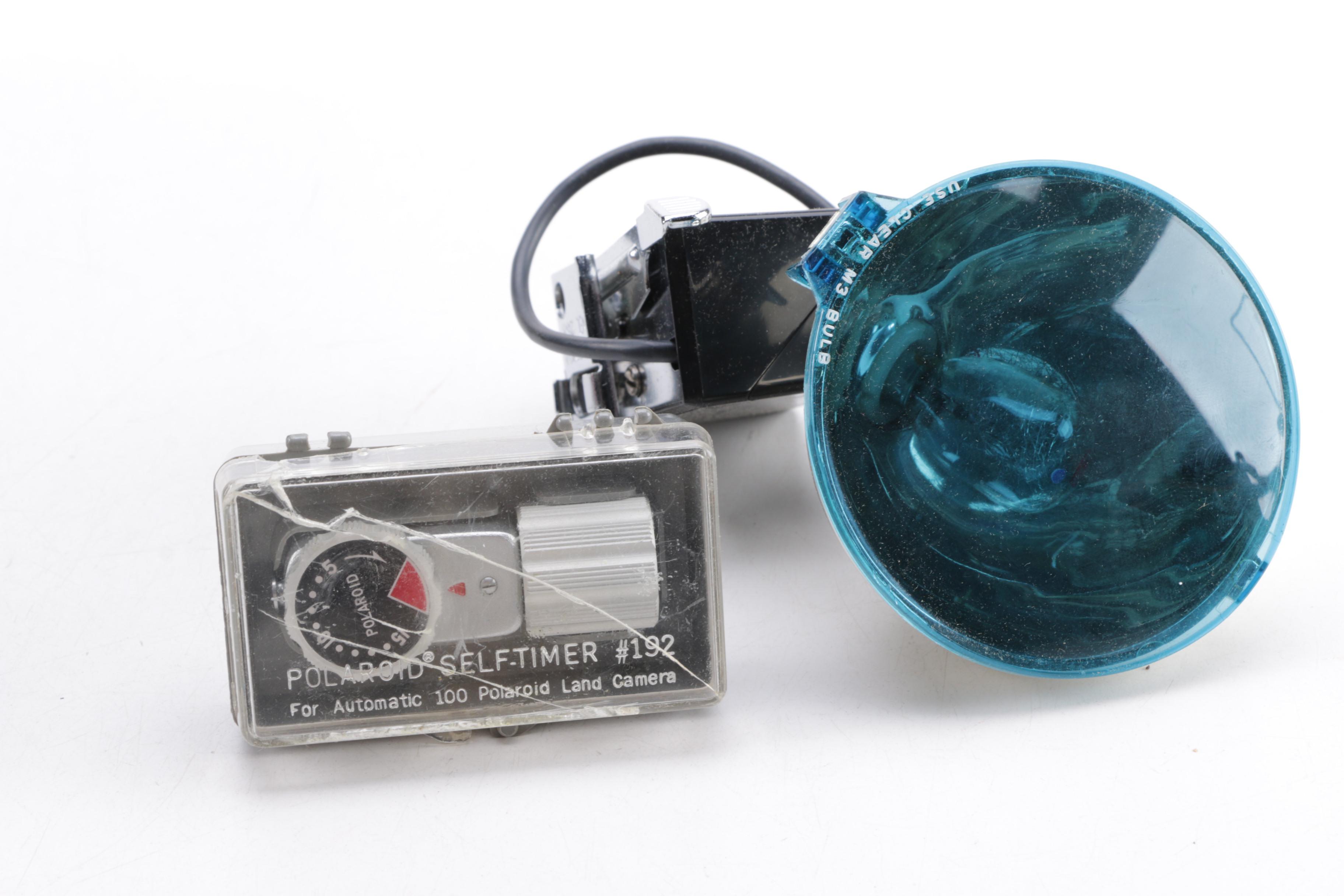 Polaroid Camera and Kodak Movie Light