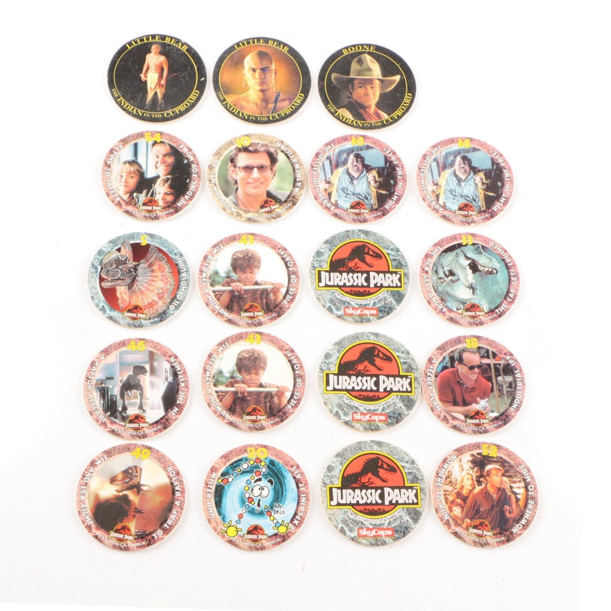 Jurassic Park and Indian in the Cupboard Pogs