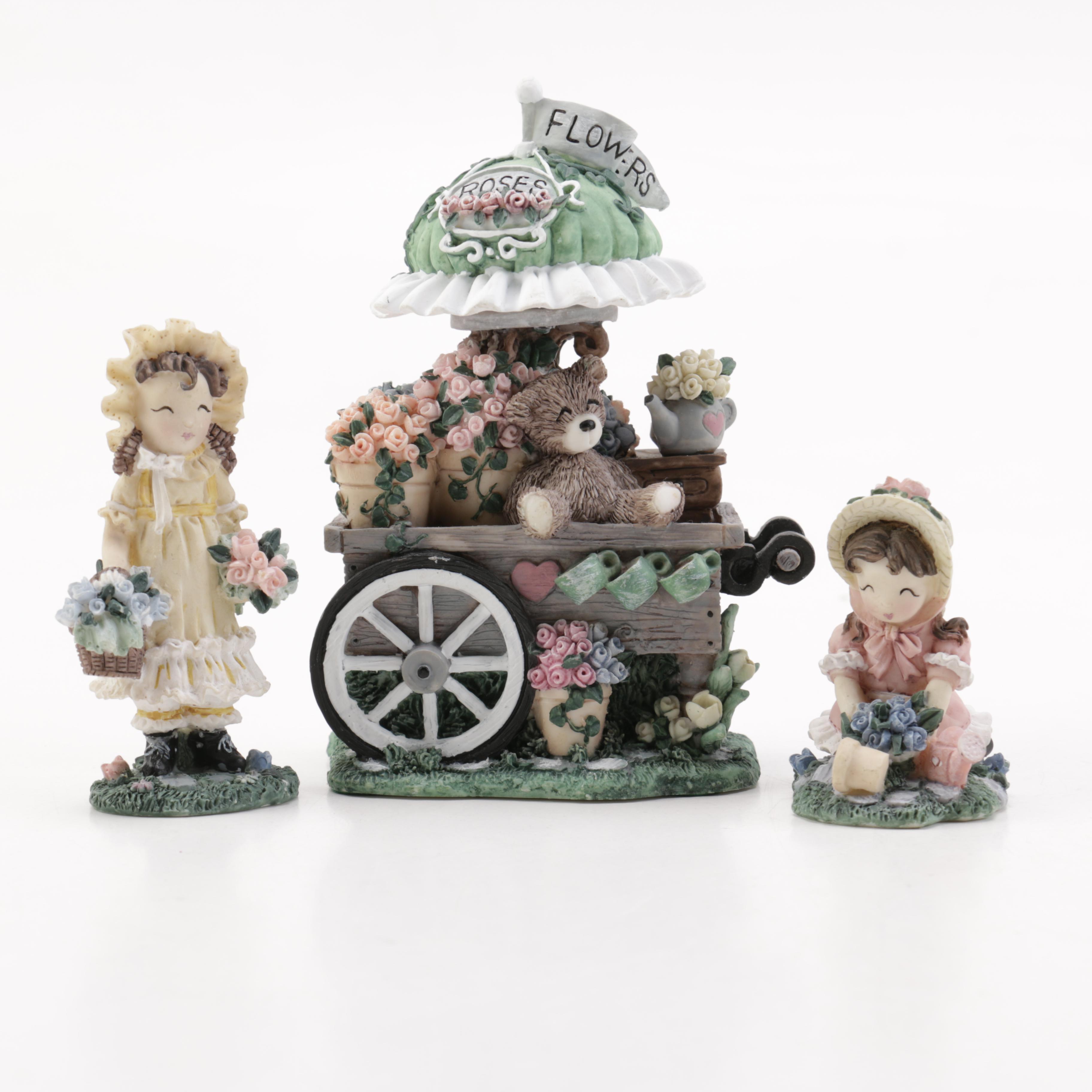 Ivy & Innocence Figurines Featuring Blossom's Flower Cart