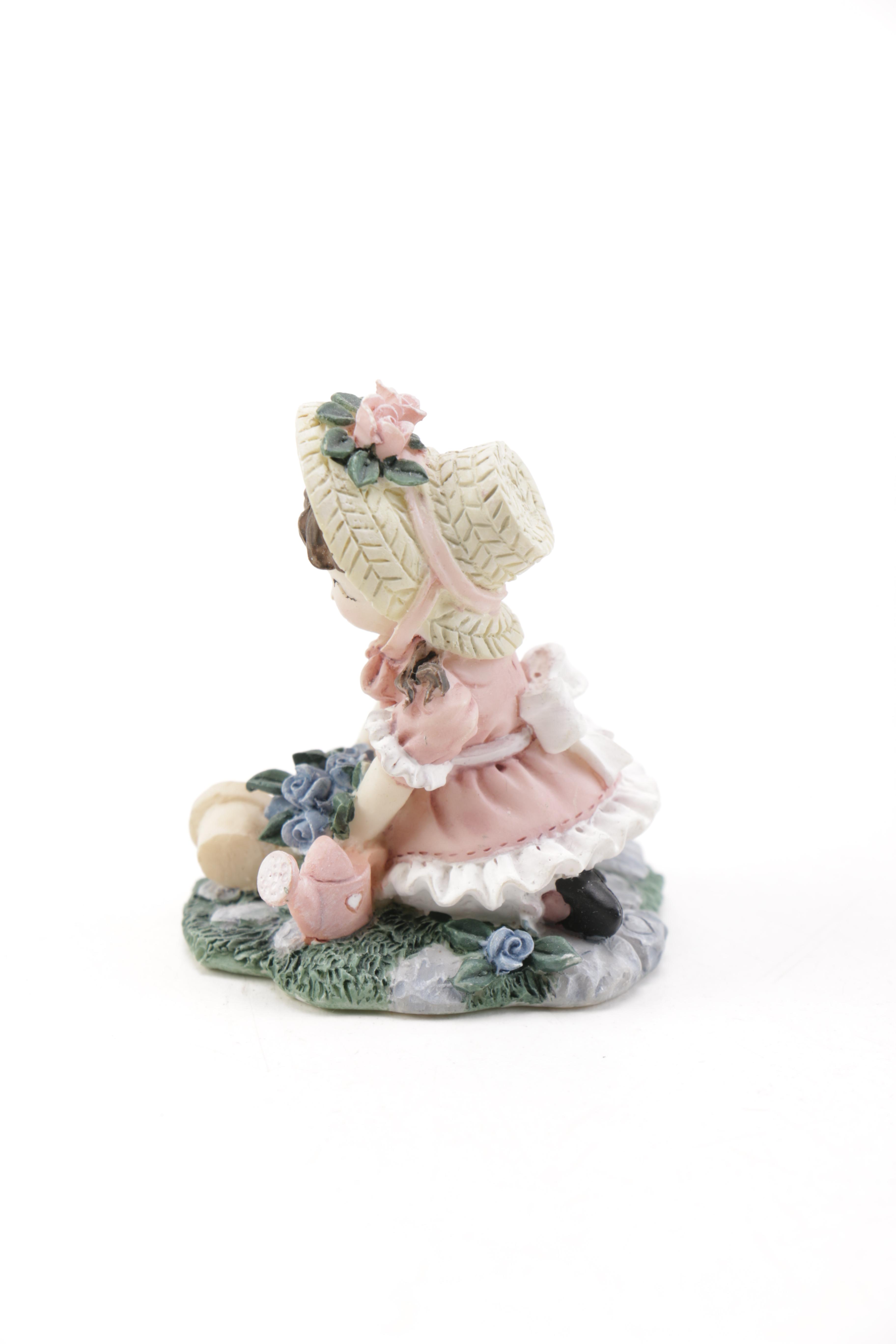 Ivy & Innocence Figurines Featuring Blossom's Flower Cart