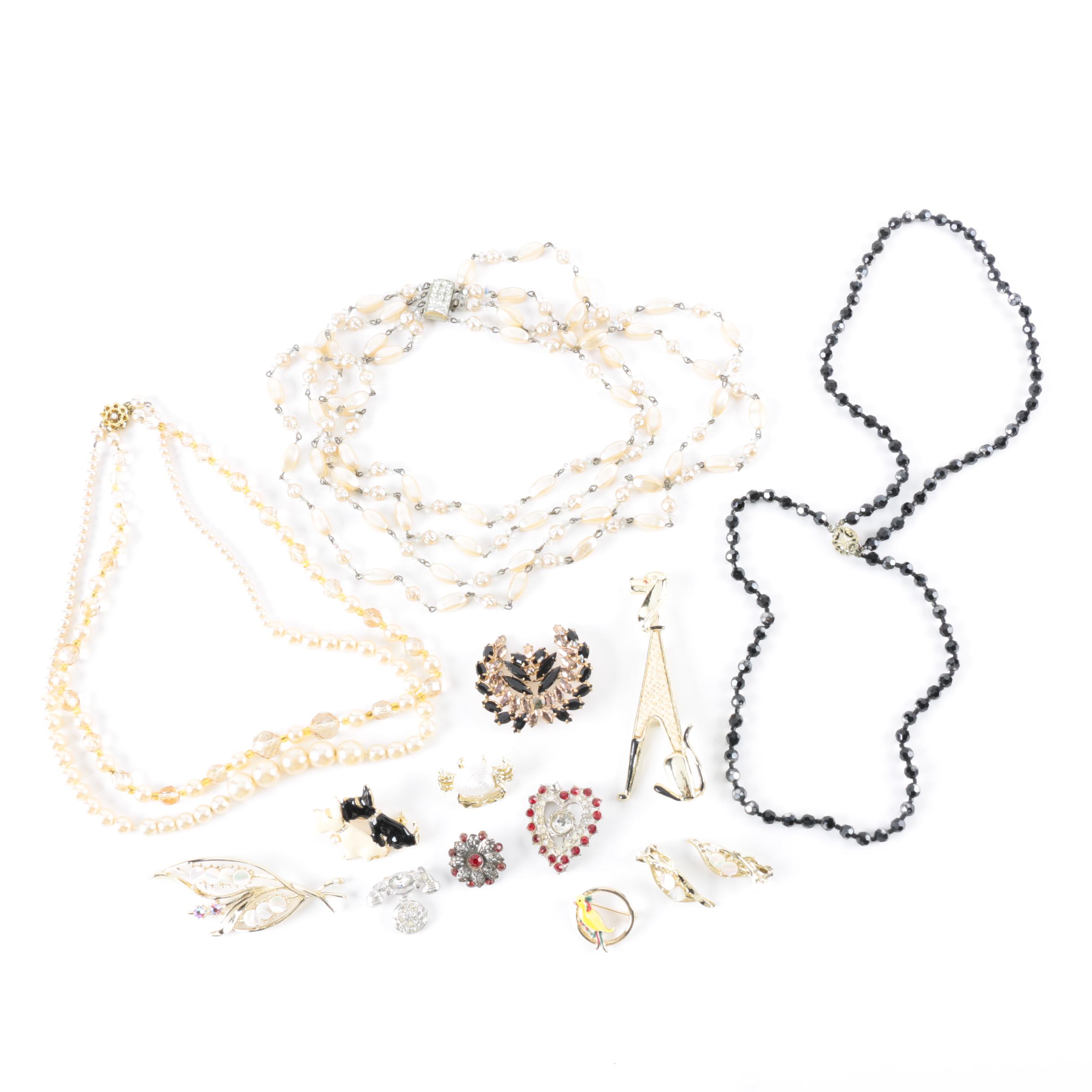 Vintage Costume Jewelry with Enamel, Mother of Pearl, and Glass Stones