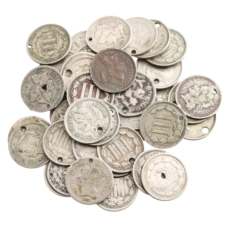 Forty-One Nickel Three-Cent Pieces 'Holed'