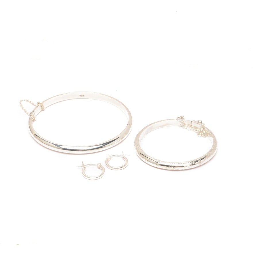 Grouping of Sterling Silver Bangle Bracelets and Hoop Earrings