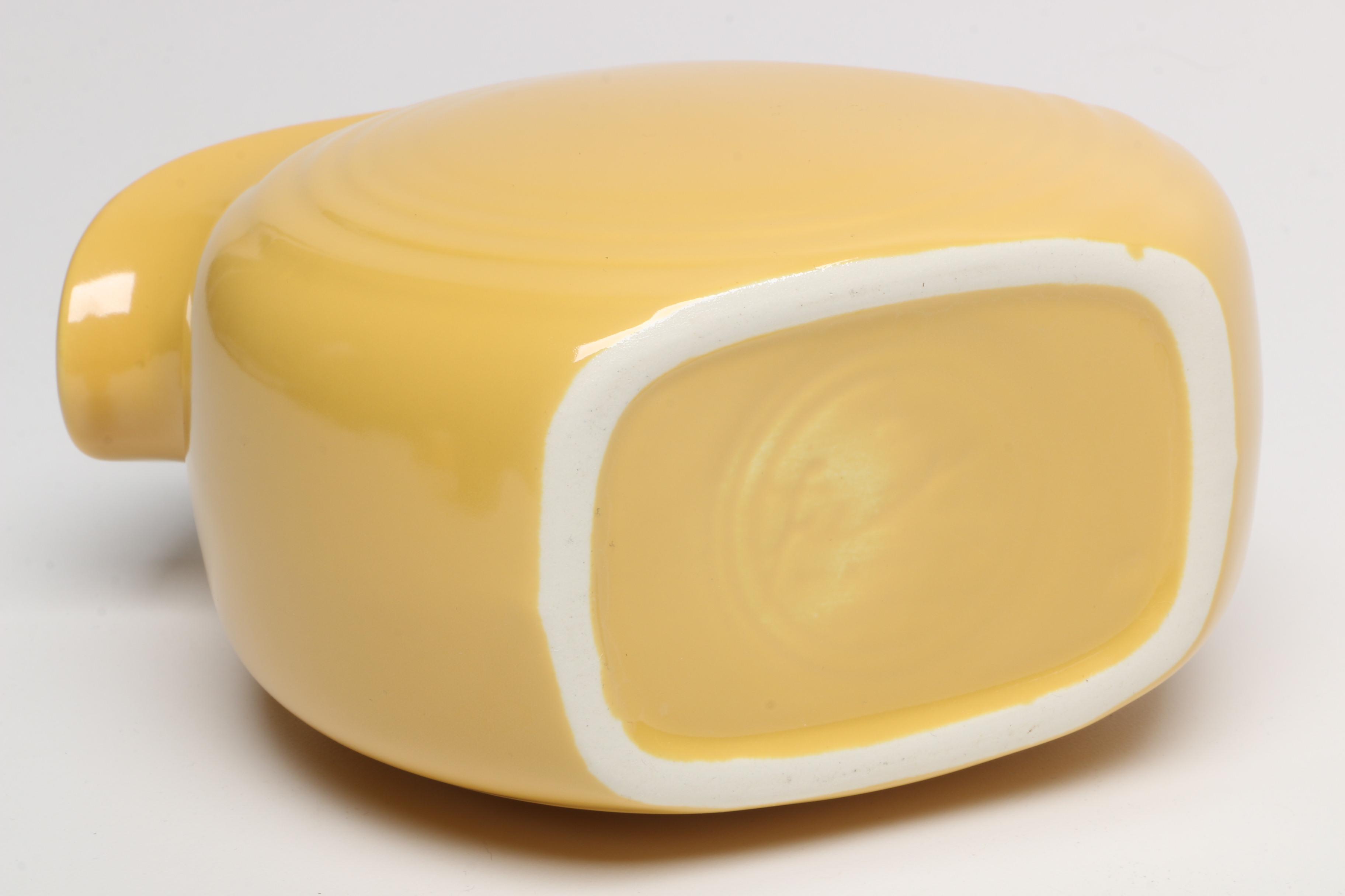 Fiesta Ware Yellow Disk Pitcher and other Tableware