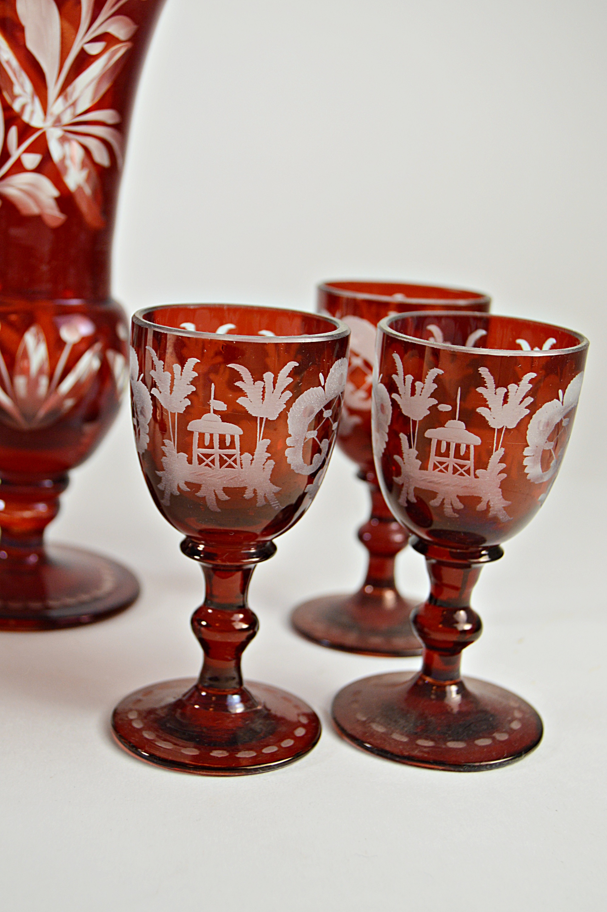 Antique Bohemian Ruby Cut-to-Clear Ruby Cordial Decanter Set with Vases
