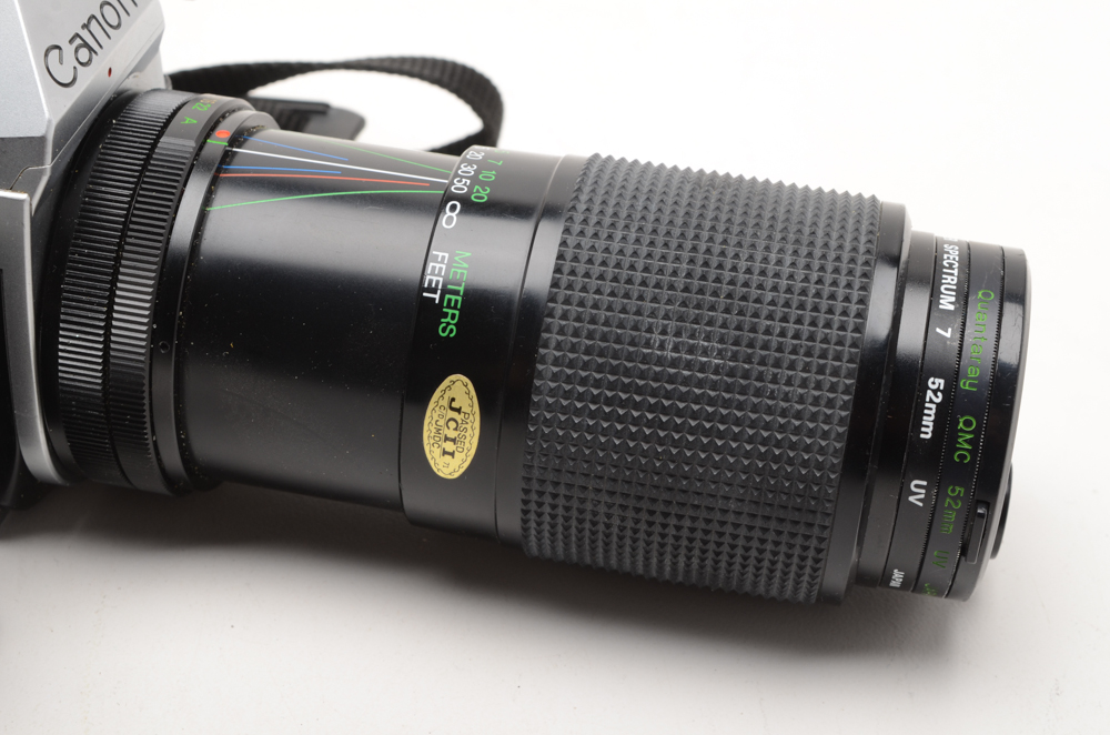 Canon AE-1 SLR 35mm Camera with Three Lenses and Flash