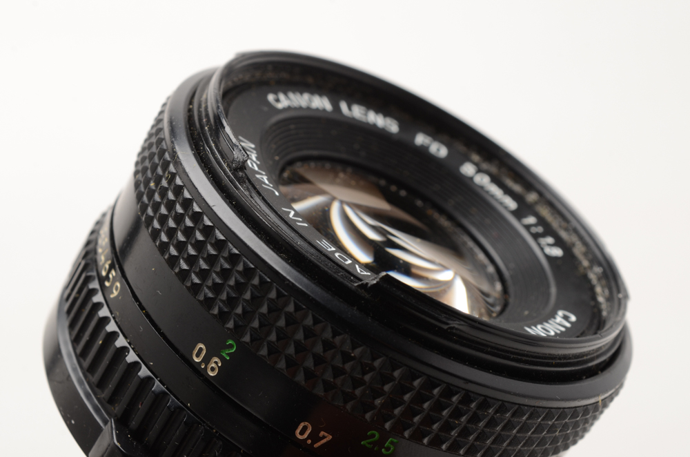 Canon AE-1 SLR 35mm Camera with Three Lenses and Flash