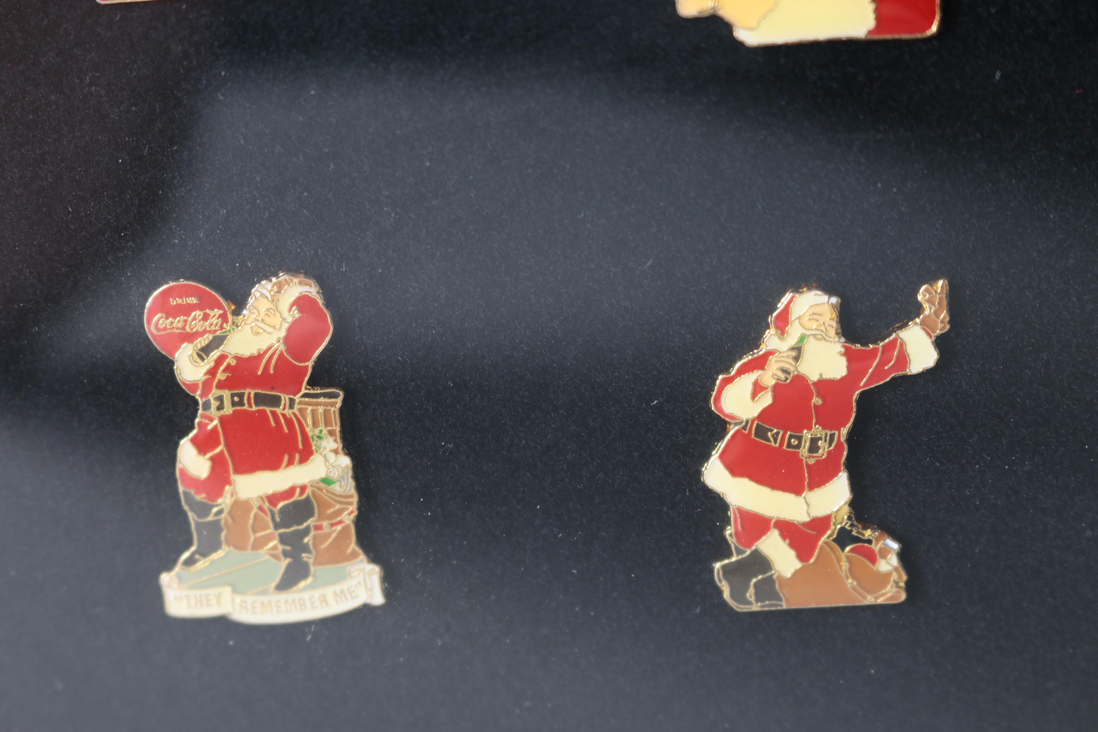 Set of Limited Edition Pinbacks After Haddon Sundblom's Coca-Cola Santa Claus