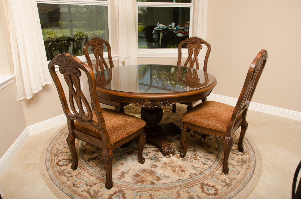 "North Shore" Dining Table and Four Chairs by Ashley Furniture