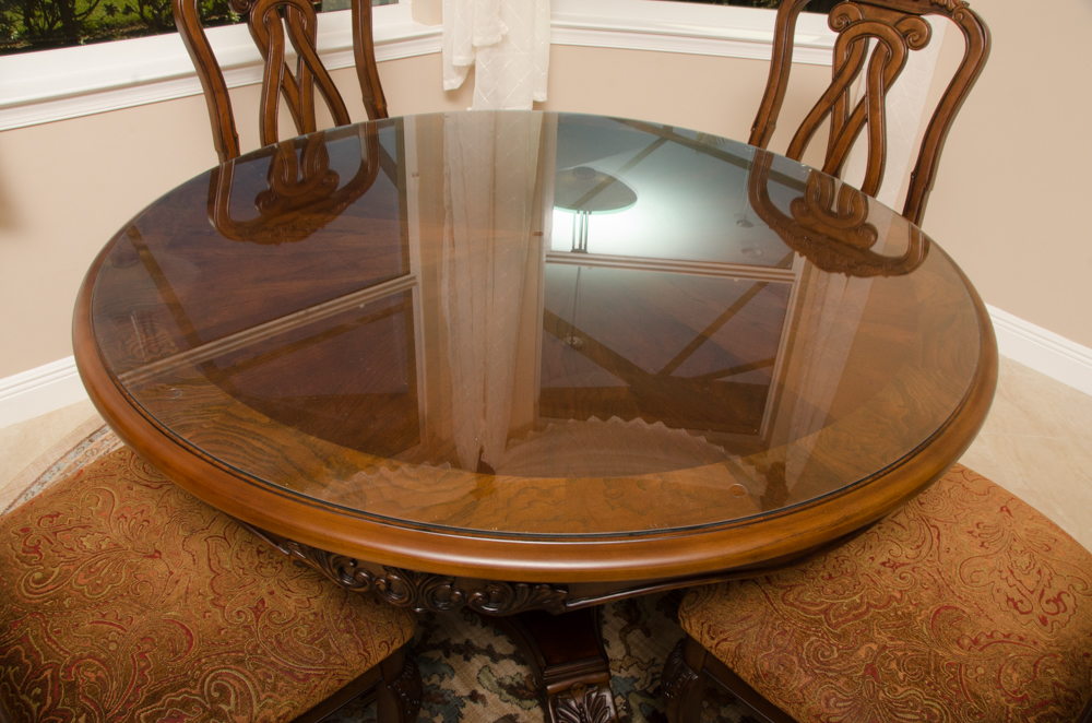 "North Shore" Dining Table and Four Chairs by Ashley Furniture