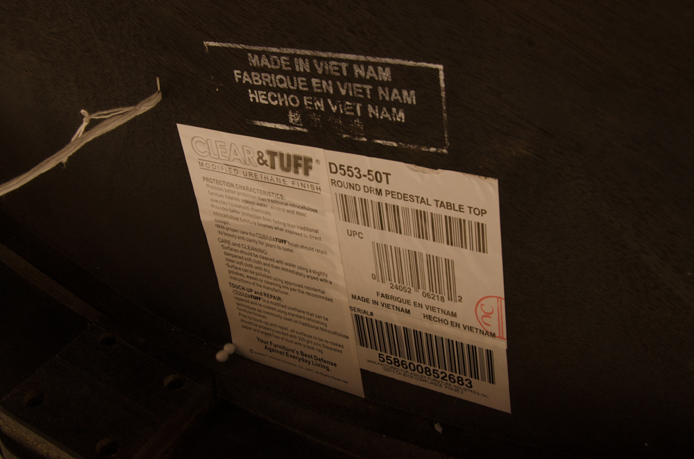 "North Shore" Dining Table and Four Chairs by Ashley Furniture