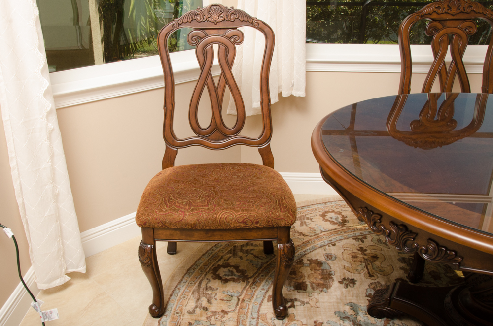 "North Shore" Dining Table and Four Chairs by Ashley Furniture