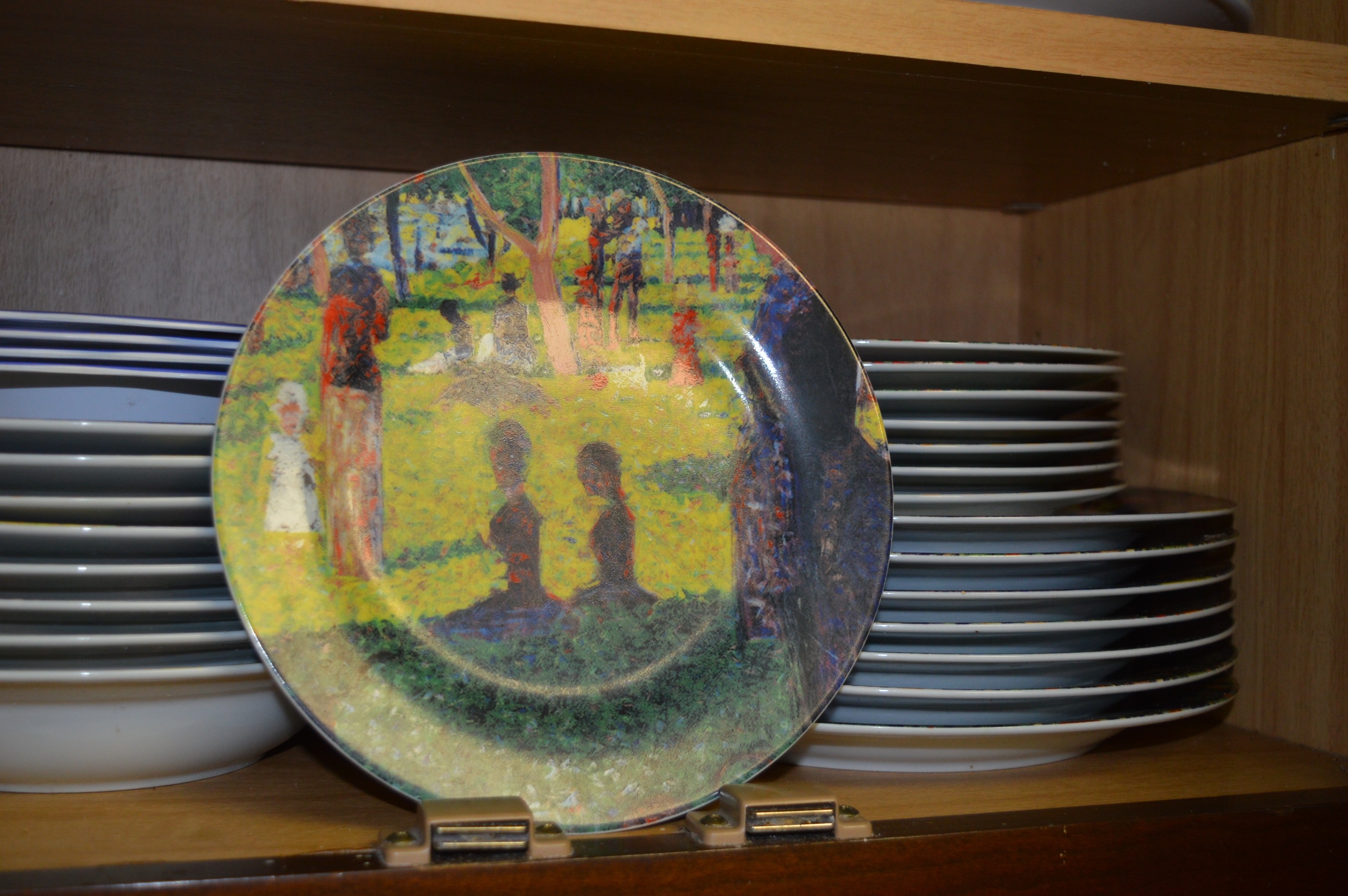 Cabinet Collection with Georges Seurat's Dishware