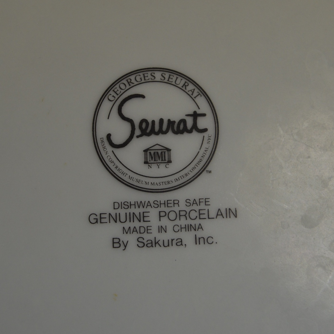 Cabinet Collection with Georges Seurat's Dishware