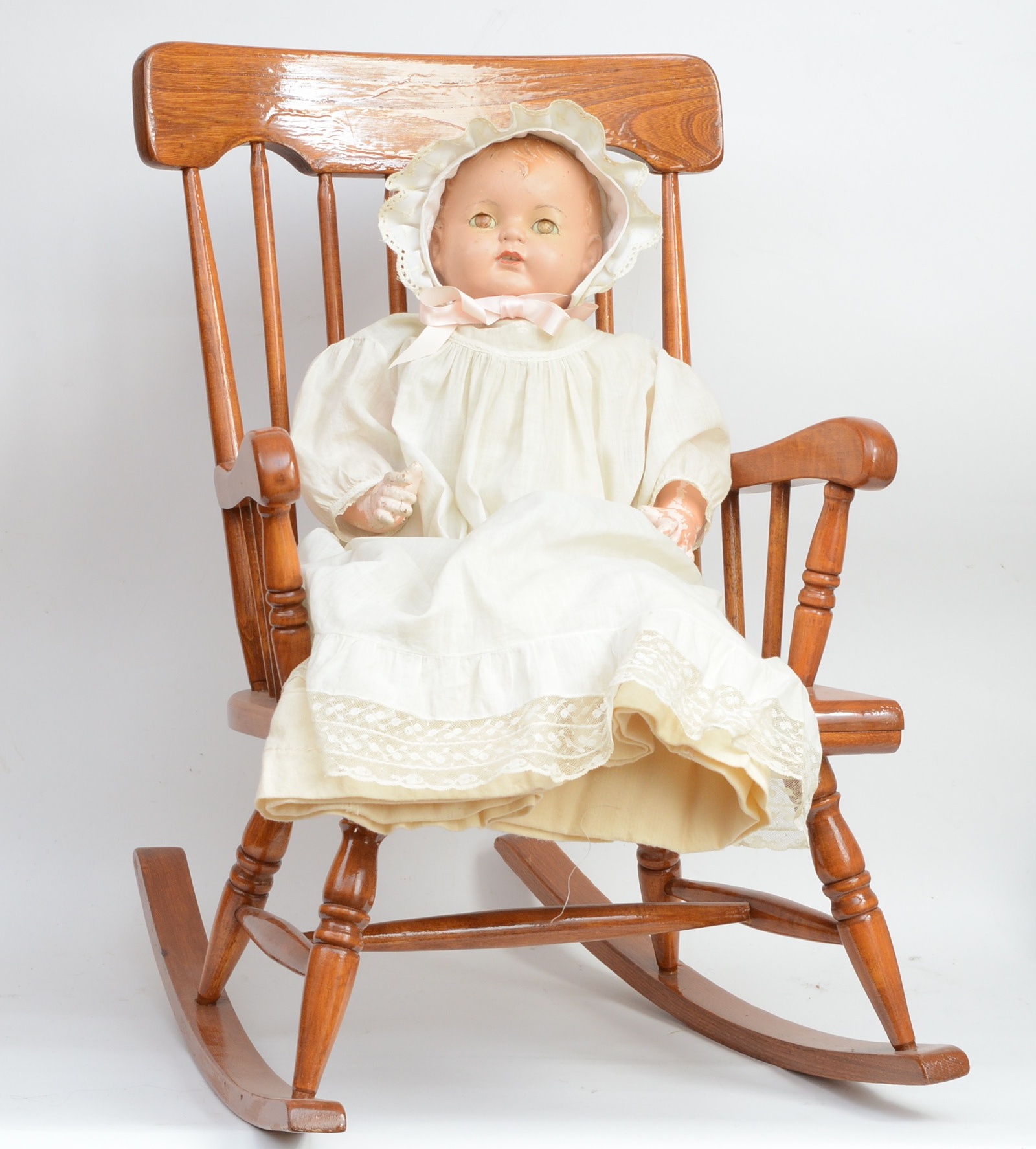 Child's Oak Rocking Chair and Antique Doll