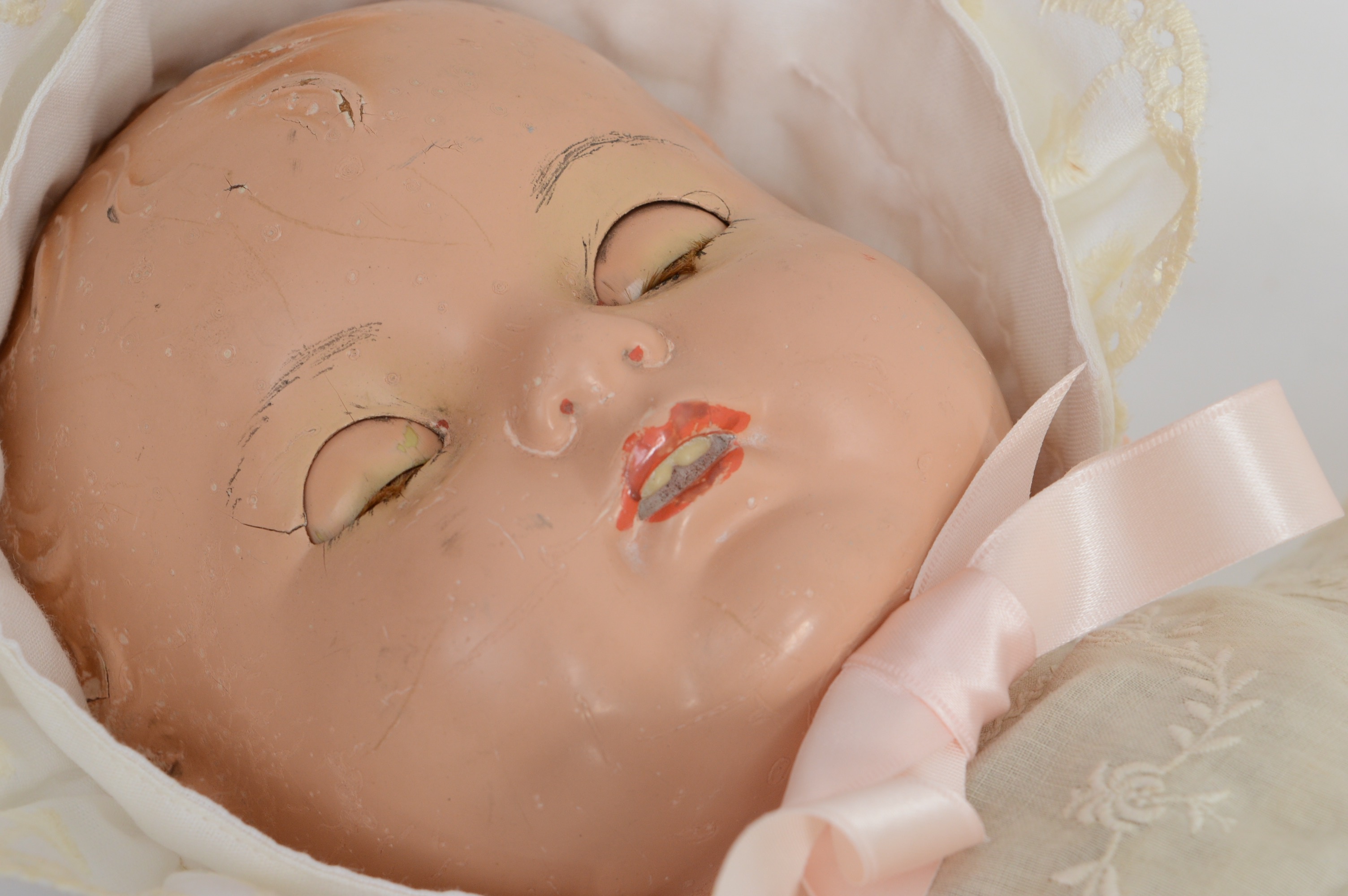 Child's Oak Rocking Chair and Antique Doll