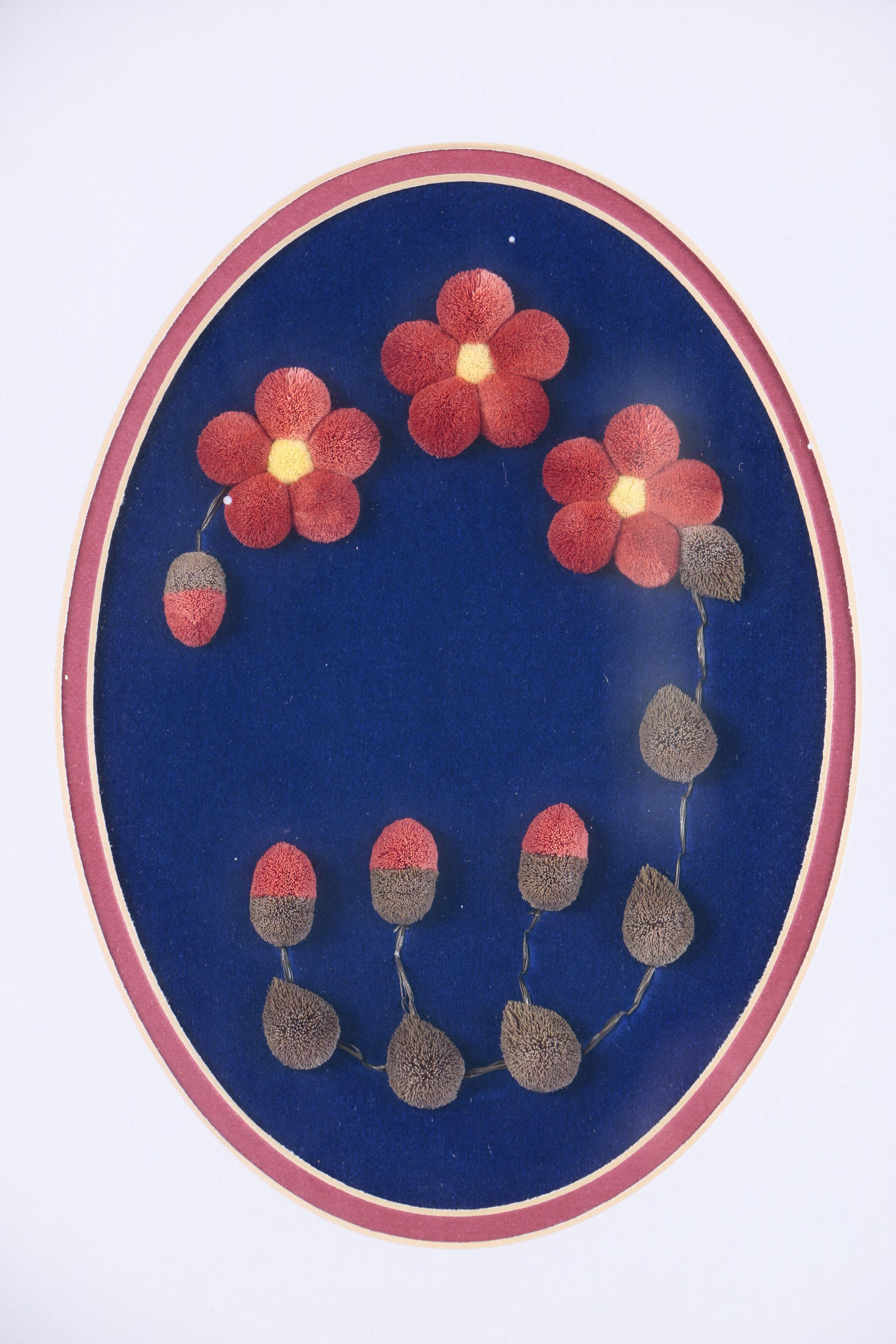 Caribou Hair Tufted Flowers on Leather