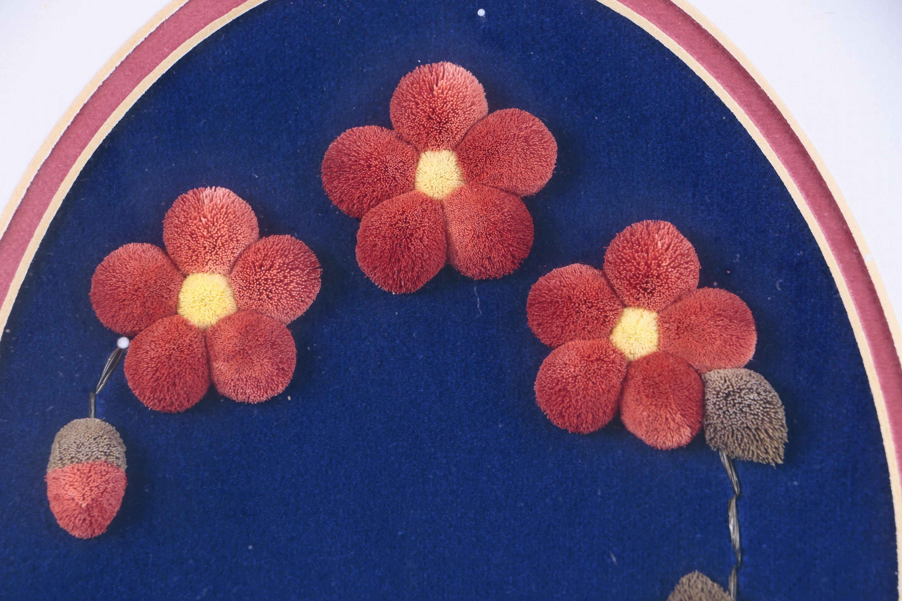 Caribou Hair Tufted Flowers on Leather