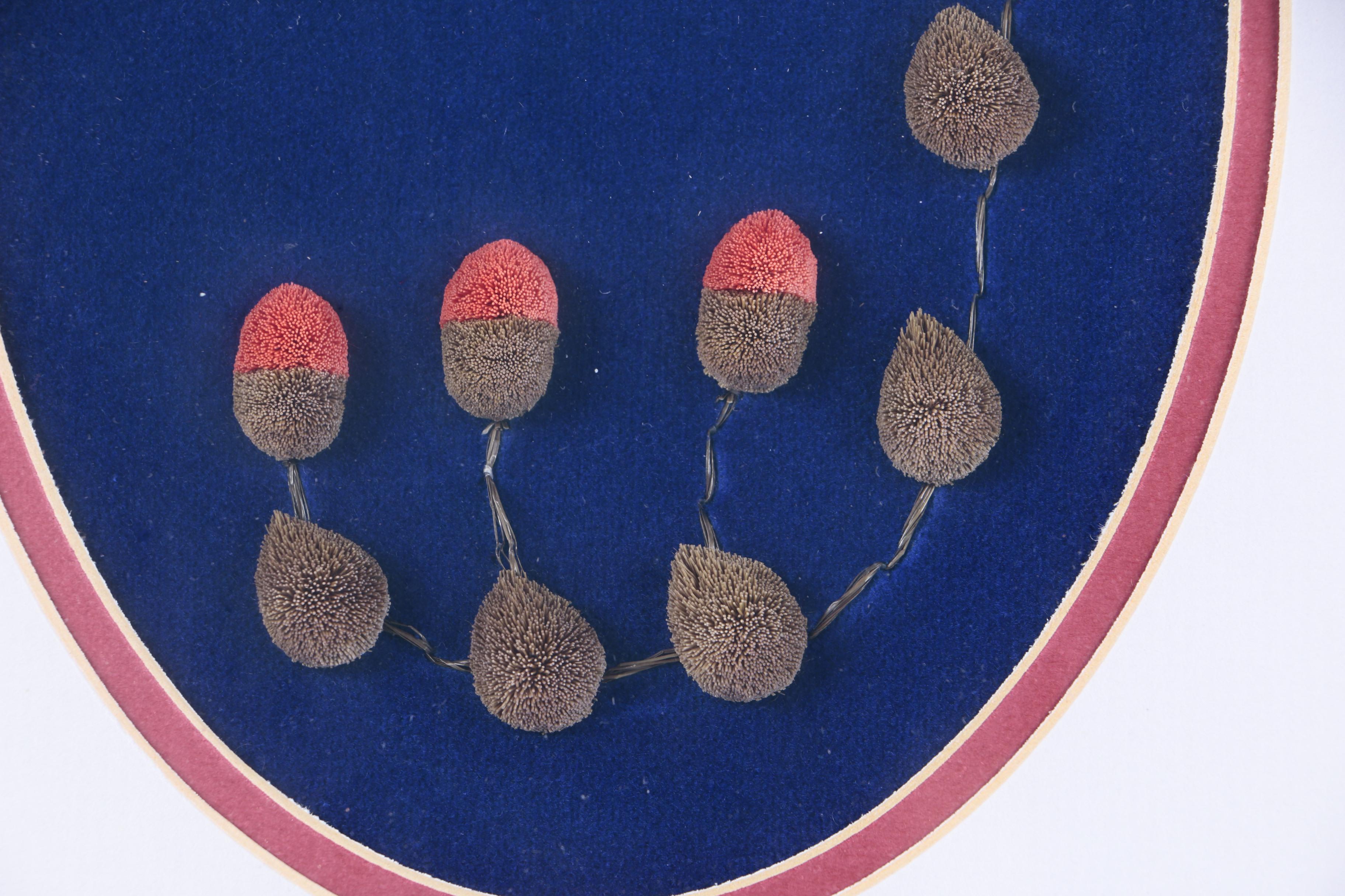 Caribou Hair Tufted Flowers on Leather