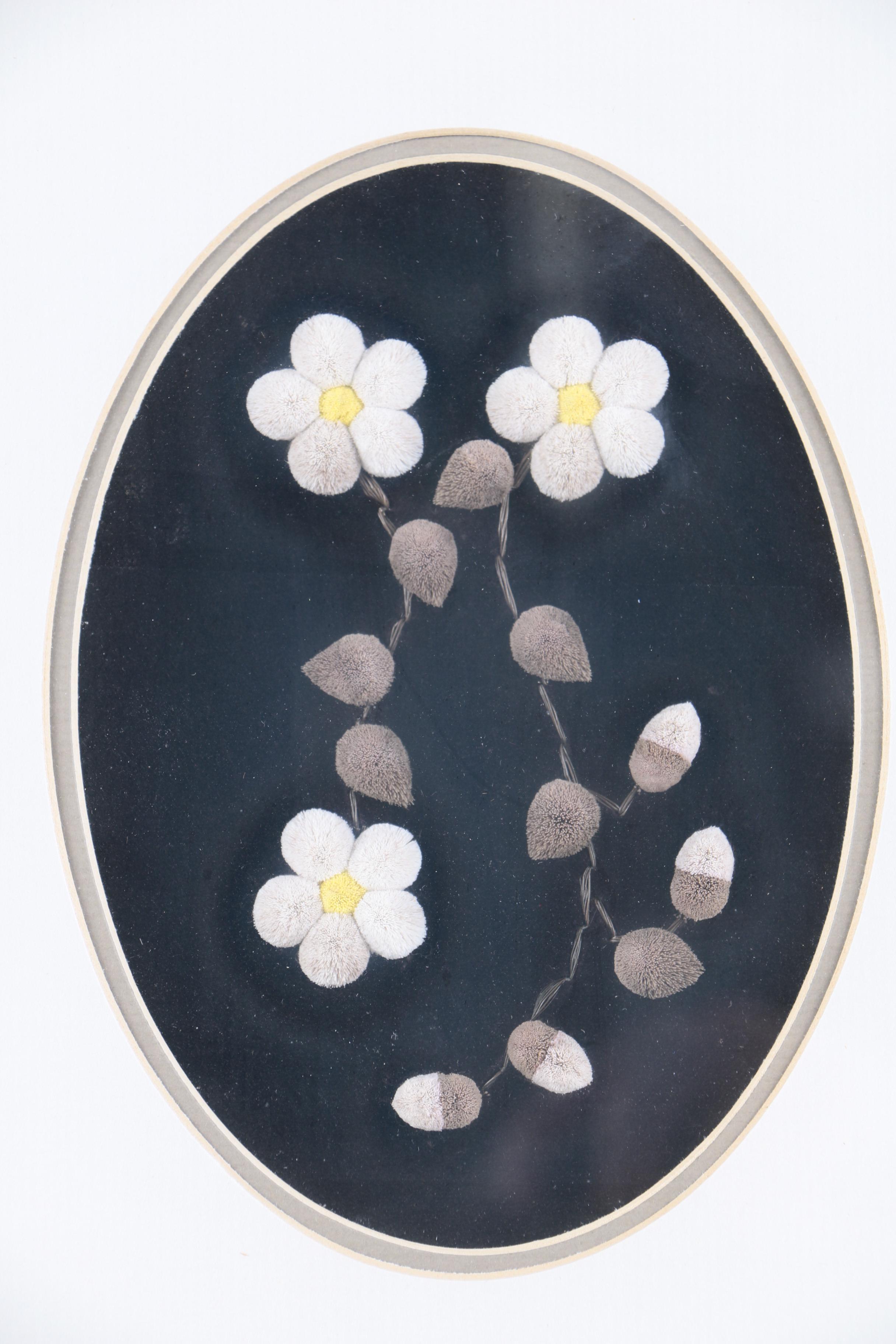 Caribou Hair Tufted Flowers on Leather