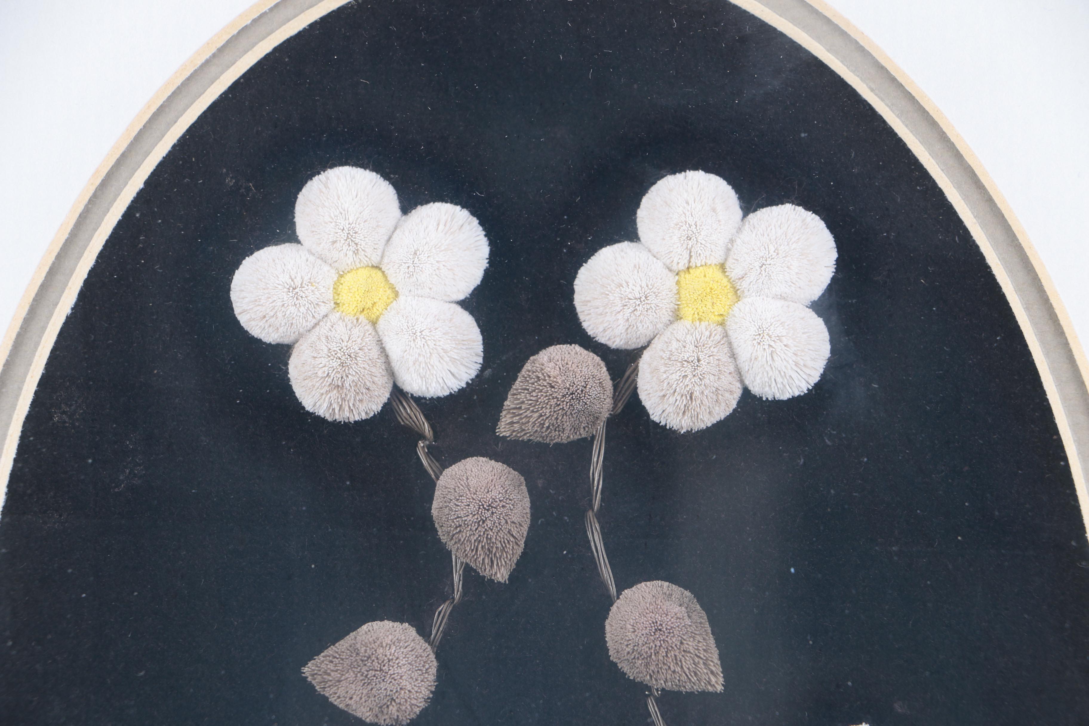 Caribou Hair Tufted Flowers on Leather