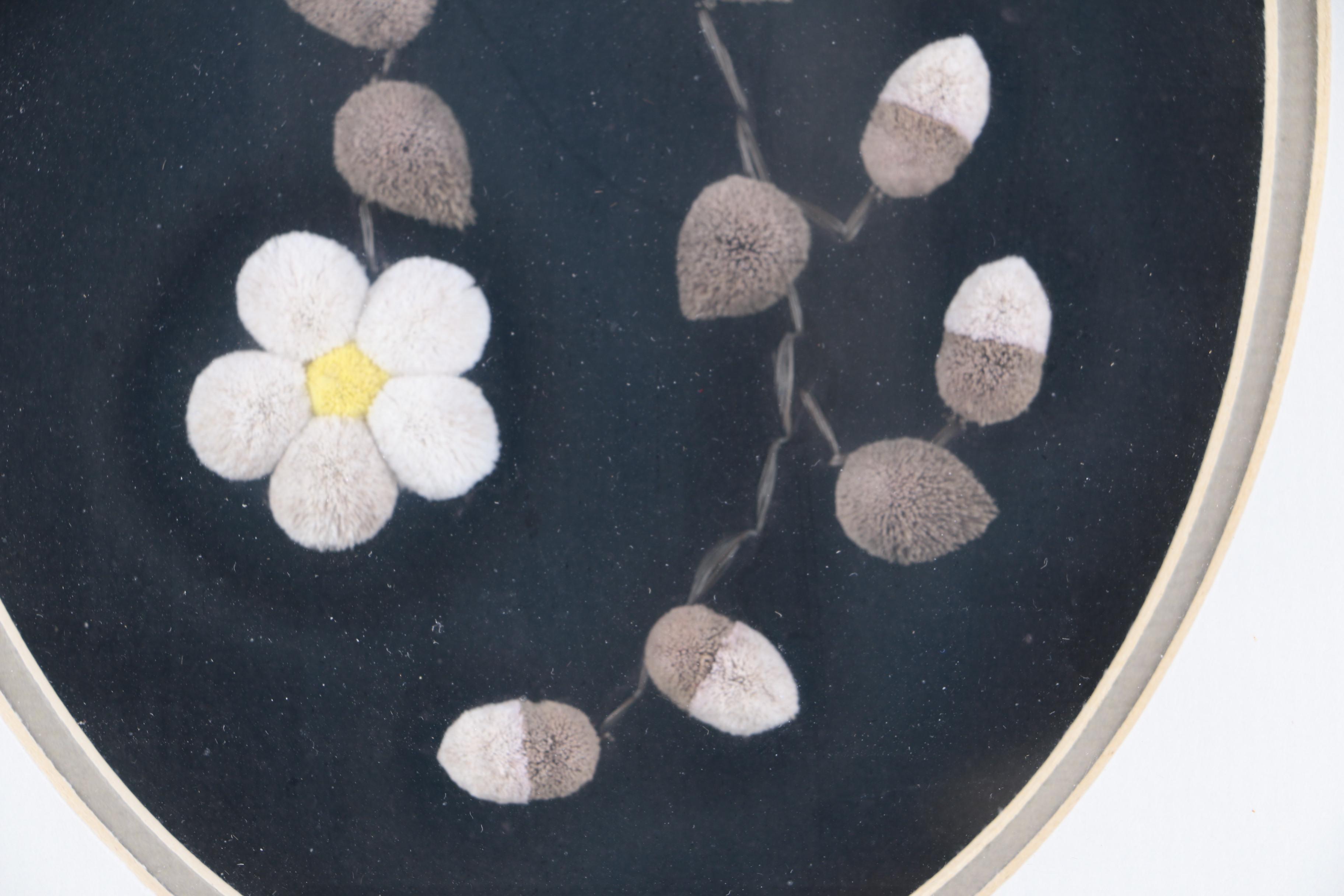 Caribou Hair Tufted Flowers on Leather