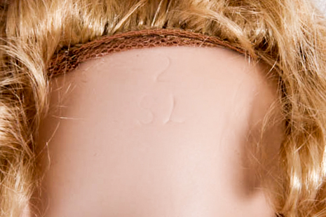 Hand-Painted Porcelain Dolls