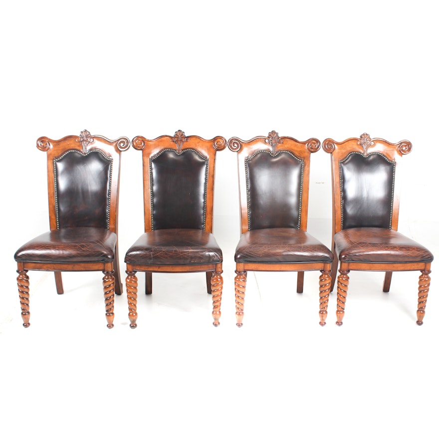 Four Carved Wood and Leather Dining Chairs