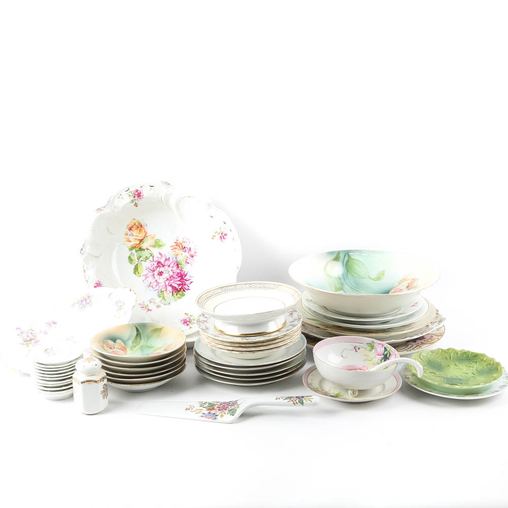 Large Assortment of Mismatched China Plates and Serving Pieces