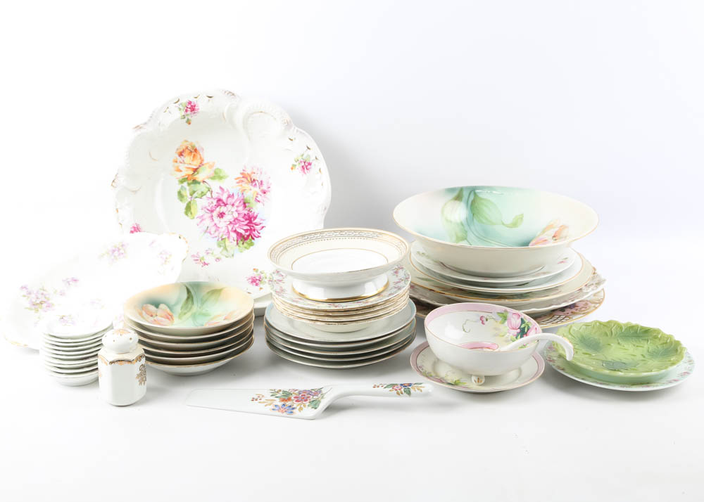 Large Assortment of Mismatched China Plates and Serving Pieces