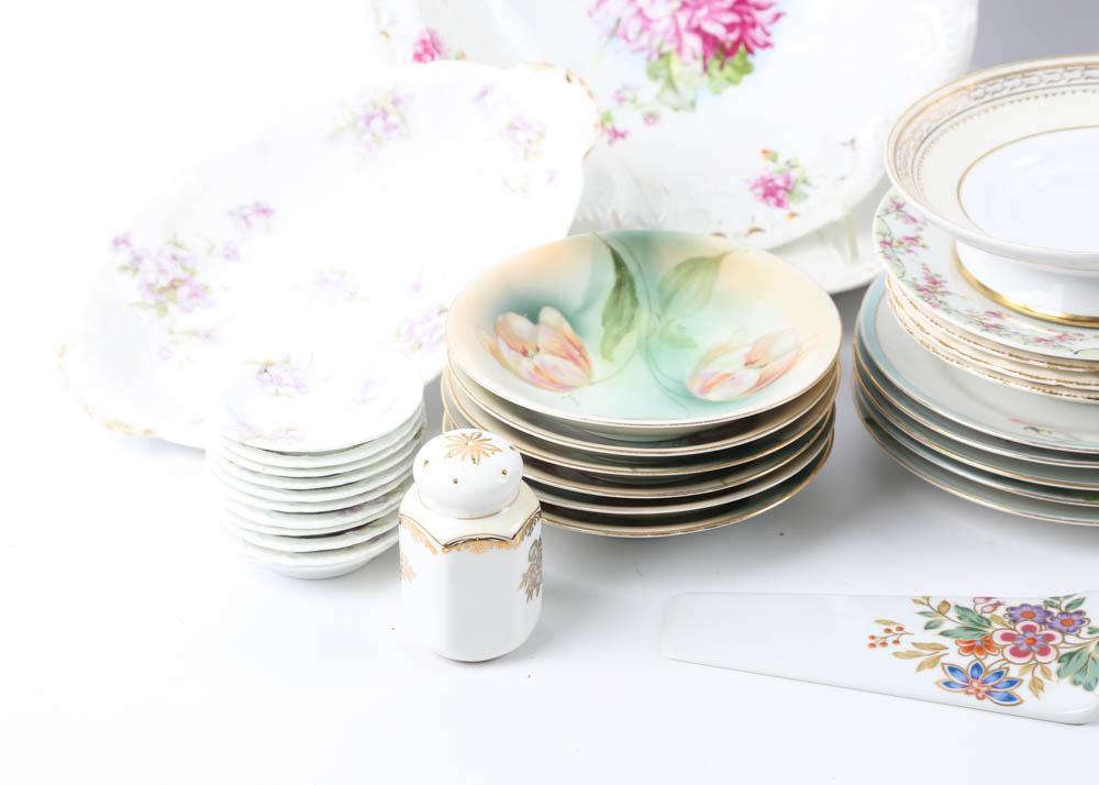 Large Assortment of Mismatched China Plates and Serving Pieces