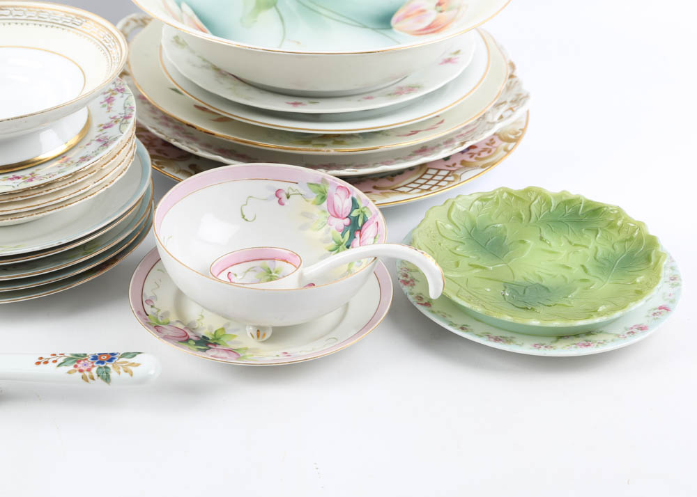 Large Assortment of Mismatched China Plates and Serving Pieces