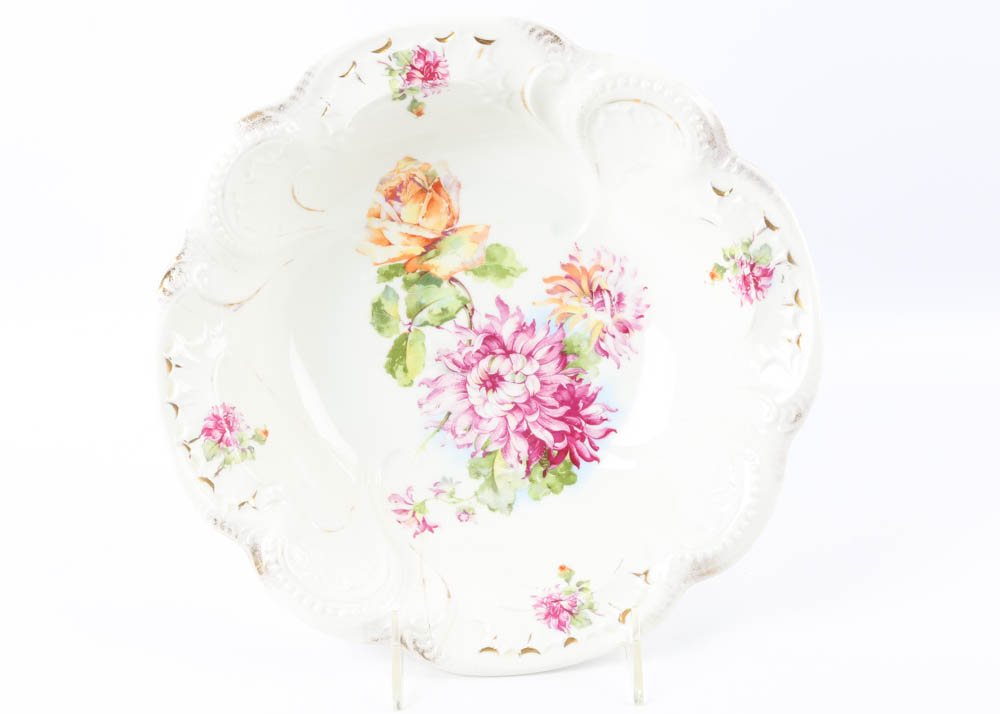 Large Assortment of Mismatched China Plates and Serving Pieces