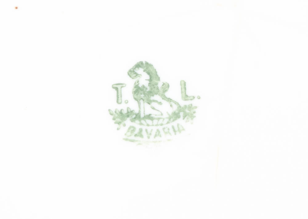 Large Assortment of Mismatched China Plates and Serving Pieces