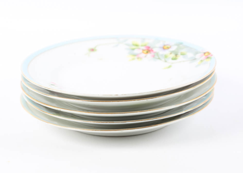 Large Assortment of Mismatched China Plates and Serving Pieces