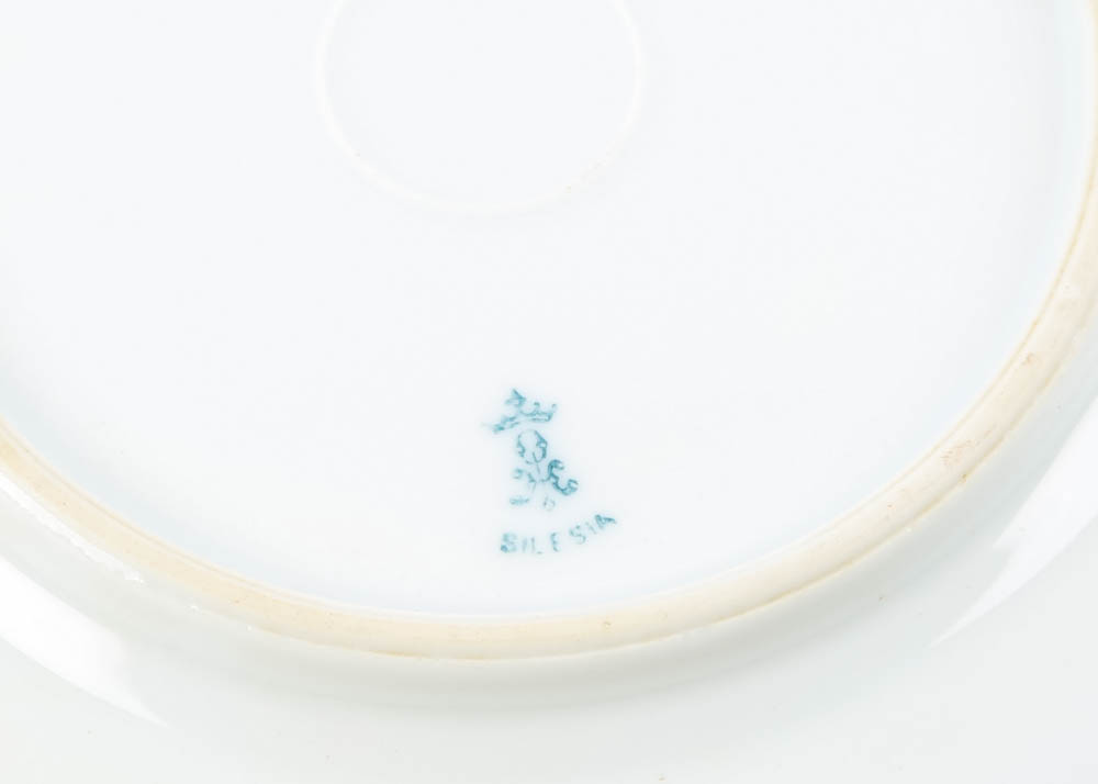 Large Assortment of Mismatched China Plates and Serving Pieces